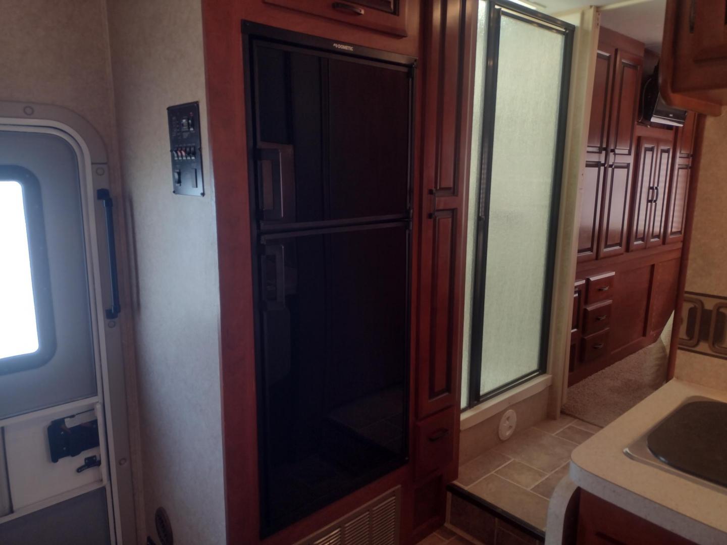 2012 White /BROWN Ford Econoline E450 (1FDXE4FS5BD) with an 6.8L V10 SOHC 20V engine, located at 17760 Hwy 62, Morris, OK, 74445, 35.609104, -95.877060 - SPRING TIME IS HERE WHAT BETTER WAY TO START YOUR TRAVELS IN THIS 2012 FORD E450 2WD FOREST RIVER SUNSEEKER 2860DS CLASS C MOTORHOME 30FT OVERALL. IT FEATURES THE TRITON 6.8L V10 ENGINE, KEYLESS ENTRY, CLOTH MANUAL SEATS, POWER WINDOWS, POWER LOCKS, POWER MIRRORS, CRUISE CONTROL, TOW HAUL MODE, BACK - Photo#41