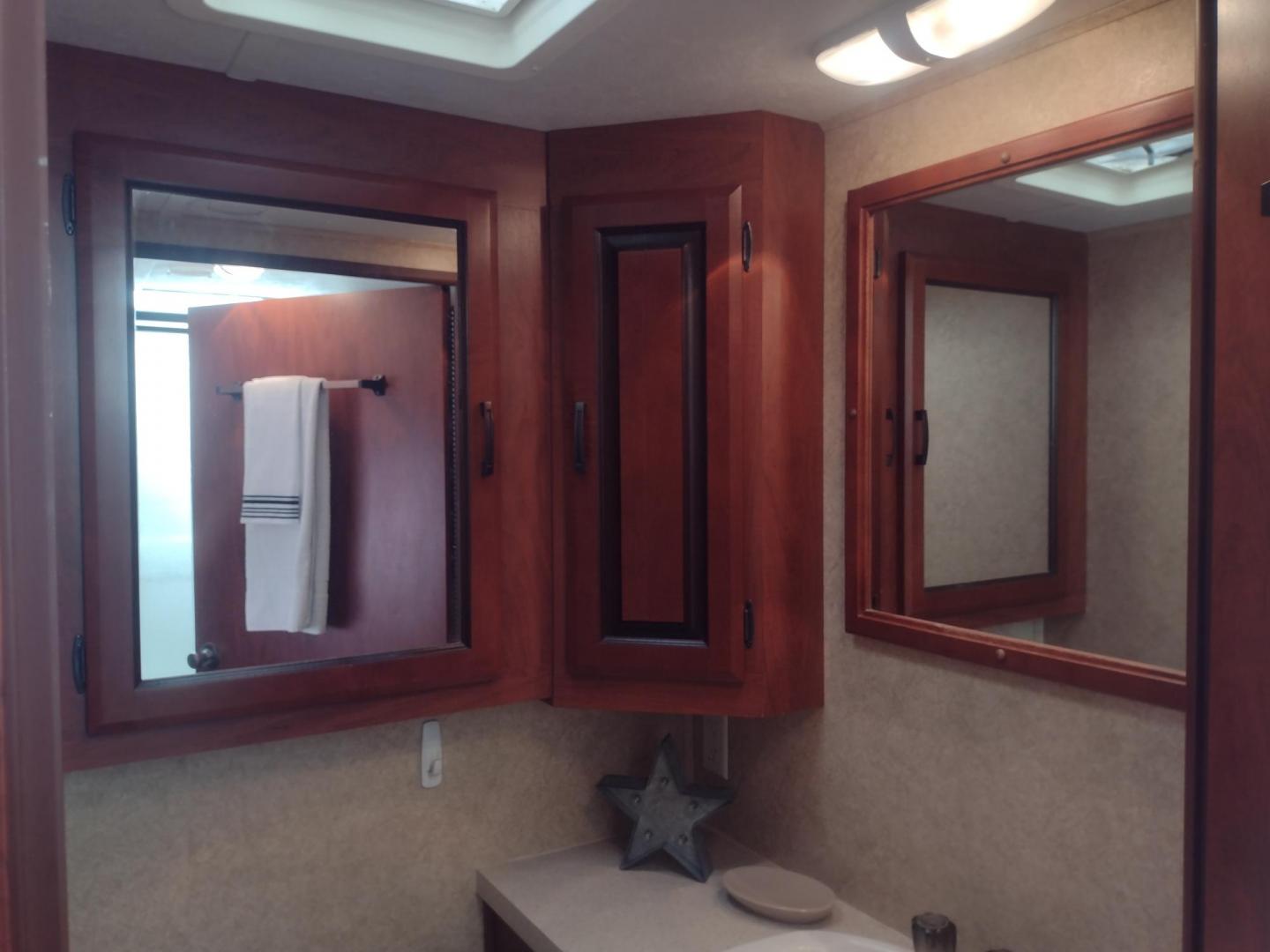 2012 White /BROWN Ford Econoline E450 (1FDXE4FS5BD) with an 6.8L V10 SOHC 20V engine, located at 17760 Hwy 62, Morris, OK, 74445, 35.609104, -95.877060 - SPRING TIME IS HERE WHAT BETTER WAY TO START YOUR TRAVELS IN THIS 2012 FORD E450 2WD FOREST RIVER SUNSEEKER 2860DS CLASS C MOTORHOME 30FT OVERALL. IT FEATURES THE TRITON 6.8L V10 ENGINE, KEYLESS ENTRY, CLOTH MANUAL SEATS, POWER WINDOWS, POWER LOCKS, POWER MIRRORS, CRUISE CONTROL, TOW HAUL MODE, BACK - Photo#44