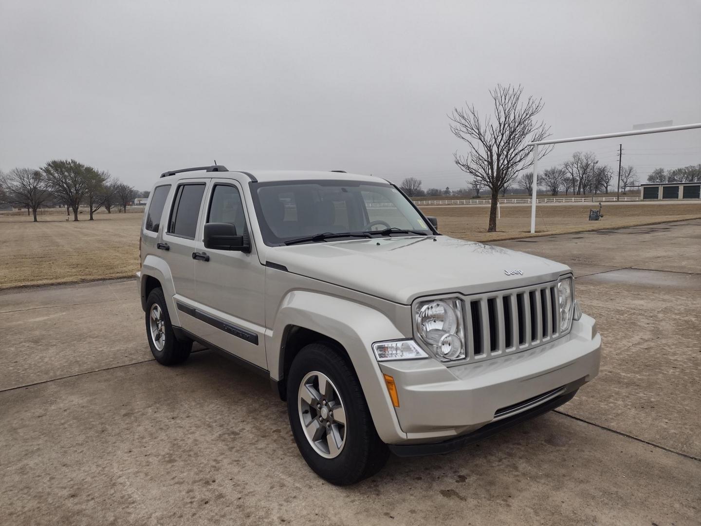 2009 Silver /TAN Jeep Liberty Sport 4WD (1J8GN28K99W) with an 3.7L V6 SOHC 12V engine, 4-Speed Automatic Overdrive transmission, located at 17760 Hwy 62, Morris, OK, 74445, (918) 733-4887, 35.609104, -95.877060 - Photo#2