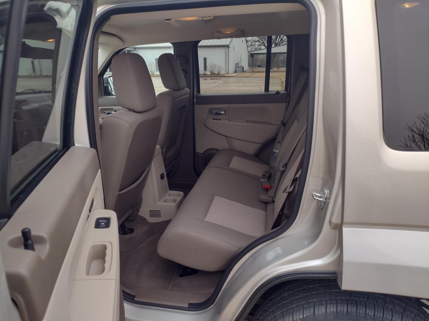 2009 Silver /TAN Jeep Liberty Sport 4WD (1J8GN28K99W) with an 3.7L V6 SOHC 12V engine, 4-Speed Automatic Overdrive transmission, located at 17760 Hwy 62, Morris, OK, 74445, (918) 733-4887, 35.609104, -95.877060 - Photo#17