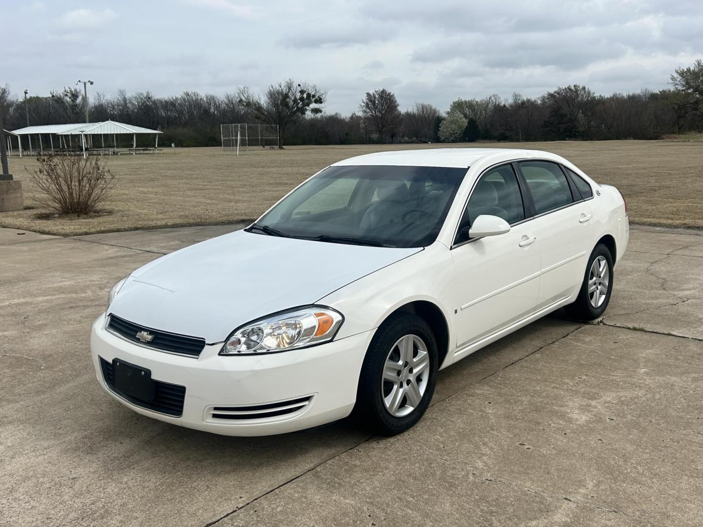2006 White /GRAY Chevrolet Impala (2G1WB58K669) with an 3.5L V6 OHV 16V FFV engine, 4-Speed Automatic Overdrive transmission, located at 17760 Hwy 62, Morris, OK, 74445, (918) 733-4887, 35.609104, -95.877060 - 2006 CHEVY IMPALA WITH 3.6L V6 ENGINE. ***REBUILT TITLE*** IT FEATURES KEYLESS ENTRY, CLOTH INTERIOR, POWER SEATS, POWER LOCKS, POWER WINDOWS, POWER MIRRORS, AM/FM RADIO, CD PLAYER, AUXILILARY PORT, CRUISE CONTROL, AND TRACTION CONTROL. ****ONLY 20,248 MILES AND NEW FIRESTONE 225/60R16 TIRES.**** - Photo#0