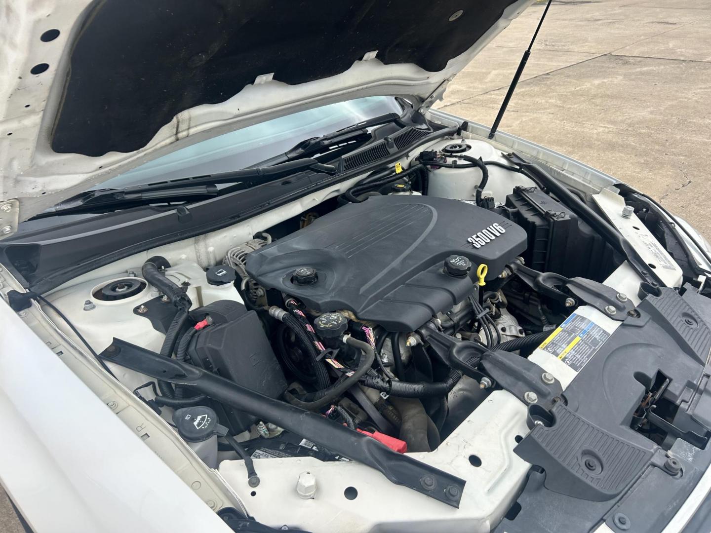 2006 White /GRAY Chevrolet Impala (2G1WB58K669) with an 3.5L V6 OHV 16V FFV engine, 4-Speed Automatic Overdrive transmission, located at 17760 Hwy 62, Morris, OK, 74445, (918) 733-4887, 35.609104, -95.877060 - 2006 CHEVY IMPALA WITH 3.6L V6 ENGINE. ***REBUILT TITLE*** IT FEATURES KEYLESS ENTRY, CLOTH INTERIOR, POWER SEATS, POWER LOCKS, POWER WINDOWS, POWER MIRRORS, AM/FM RADIO, CD PLAYER, AUXILILARY PORT, CRUISE CONTROL, AND TRACTION CONTROL. ****ONLY 20,248 MILES AND NEW FIRESTONE 225/60R16 TIRES.**** - Photo#17