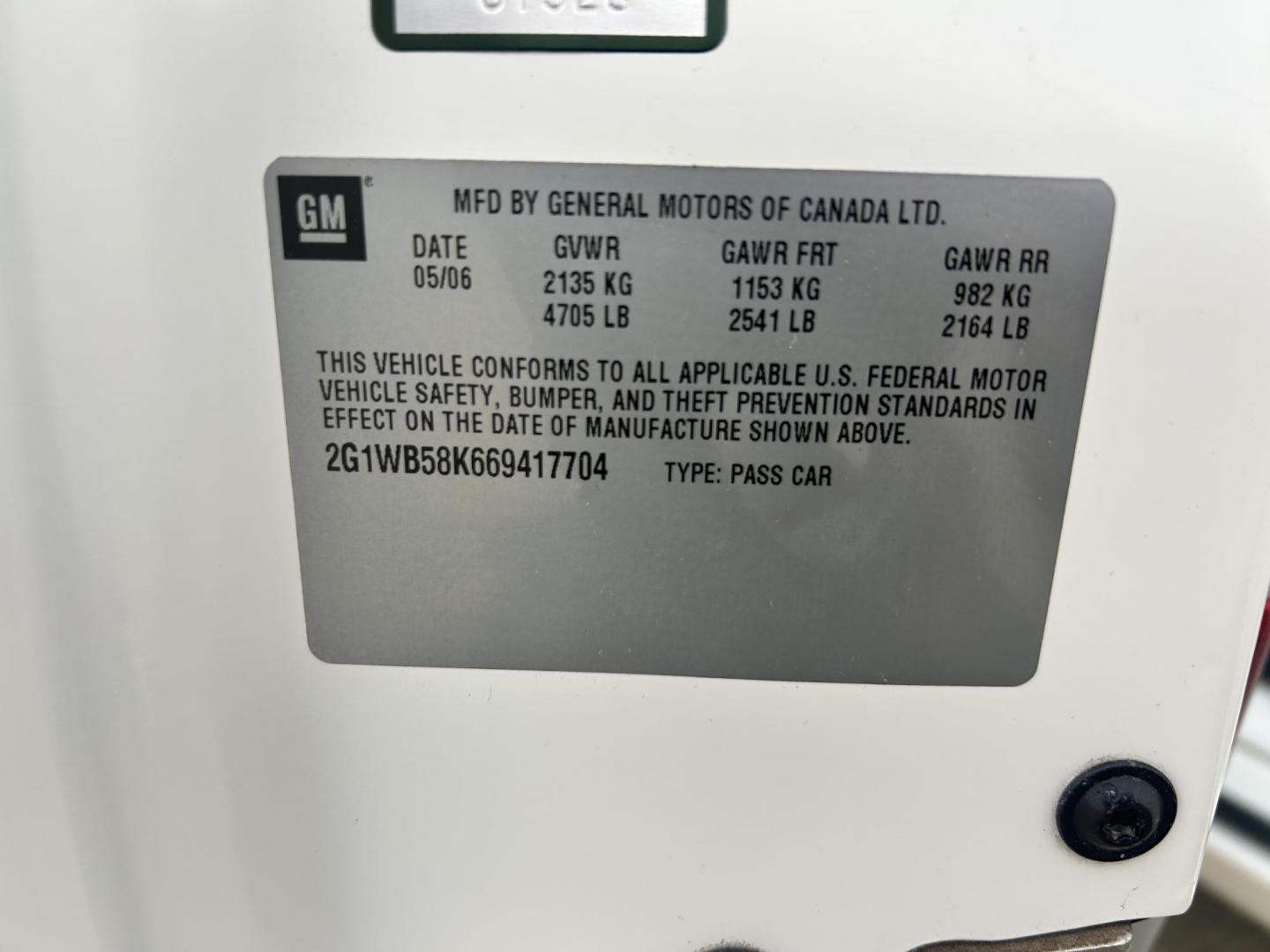 2006 White /GRAY Chevrolet Impala (2G1WB58K669) with an 3.5L V6 OHV 16V FFV engine, 4-Speed Automatic Overdrive transmission, located at 17760 Hwy 62, Morris, OK, 74445, (918) 733-4887, 35.609104, -95.877060 - 2006 CHEVY IMPALA WITH 3.6L V6 ENGINE. ***REBUILT TITLE*** IT FEATURES KEYLESS ENTRY, CLOTH INTERIOR, POWER SEATS, POWER LOCKS, POWER WINDOWS, POWER MIRRORS, AM/FM RADIO, CD PLAYER, AUXILILARY PORT, CRUISE CONTROL, AND TRACTION CONTROL. ****ONLY 20,248 MILES AND NEW FIRESTONE 225/60R16 TIRES.**** - Photo#23