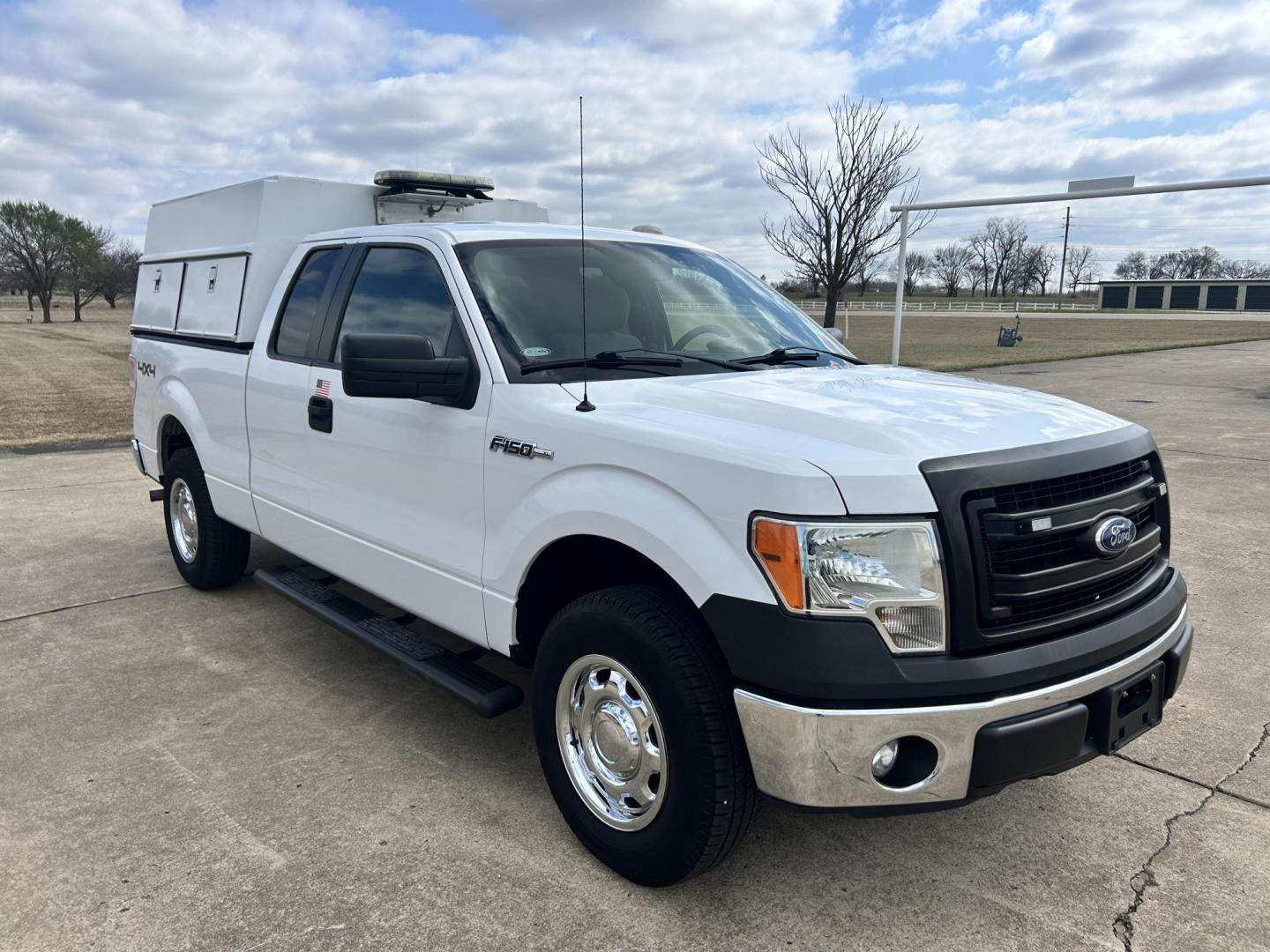 2014 White /Gray Ford F-150 XL (1FTEX1EM8EK) with an 3.7L V6 DOHC 24V engine, 6-Speed Automatic transmission, located at 17760 Hwy 62, Morris, OK, 74445, (918) 733-4887, 35.609104, -95.877060 - 2014 FORD F-150 4WD HAS A 3.7L V6 ENGINGE BI-FUEL SYSTEM RUNS ON CNG (COMPRESSED NATURAL GAS) OR GASOLINE. IT FEATURES CLOTH INTERIOR, MANUAL SEATS, POWER WINDOWS, POWER LOCKS, POWER MIRRORS, AM/FM STEREO, SIRIUS RADIO, CD PLAYER, AUXILLIARY PORT, CRUISE CONTROL, TRACTION CONTROL, BACKUP CAMERA, MUL - Photo#2