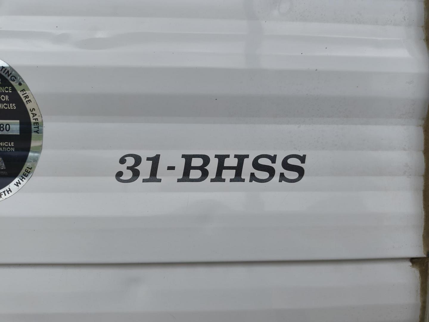 2015 White /BROWN Forest River PUMA 31BHSS 31BHSS (4X4TPUG23FP) , located at 17760 Hwy 62, Morris, OK, 74445, 35.609104, -95.877060 - CAMPING SEASON IS RIGHT AROUND THE CORNER SO CHECK OUT THIS 2015 FOREST RIVER PUMA 31BHSS 34.5FT OVERALL WITH 15FT POWER AWNING. IN THE FRONT IS THE MASTER BEDROOM WITH A QUEEN SIZE BED, STORAGE UNDER THE BED, TWO WARDROBE CLOSETS, AND OVERHEAD CABINETS. IN THE LIVING AND KITCHEN AREA THERE IS A ENT - Photo#7