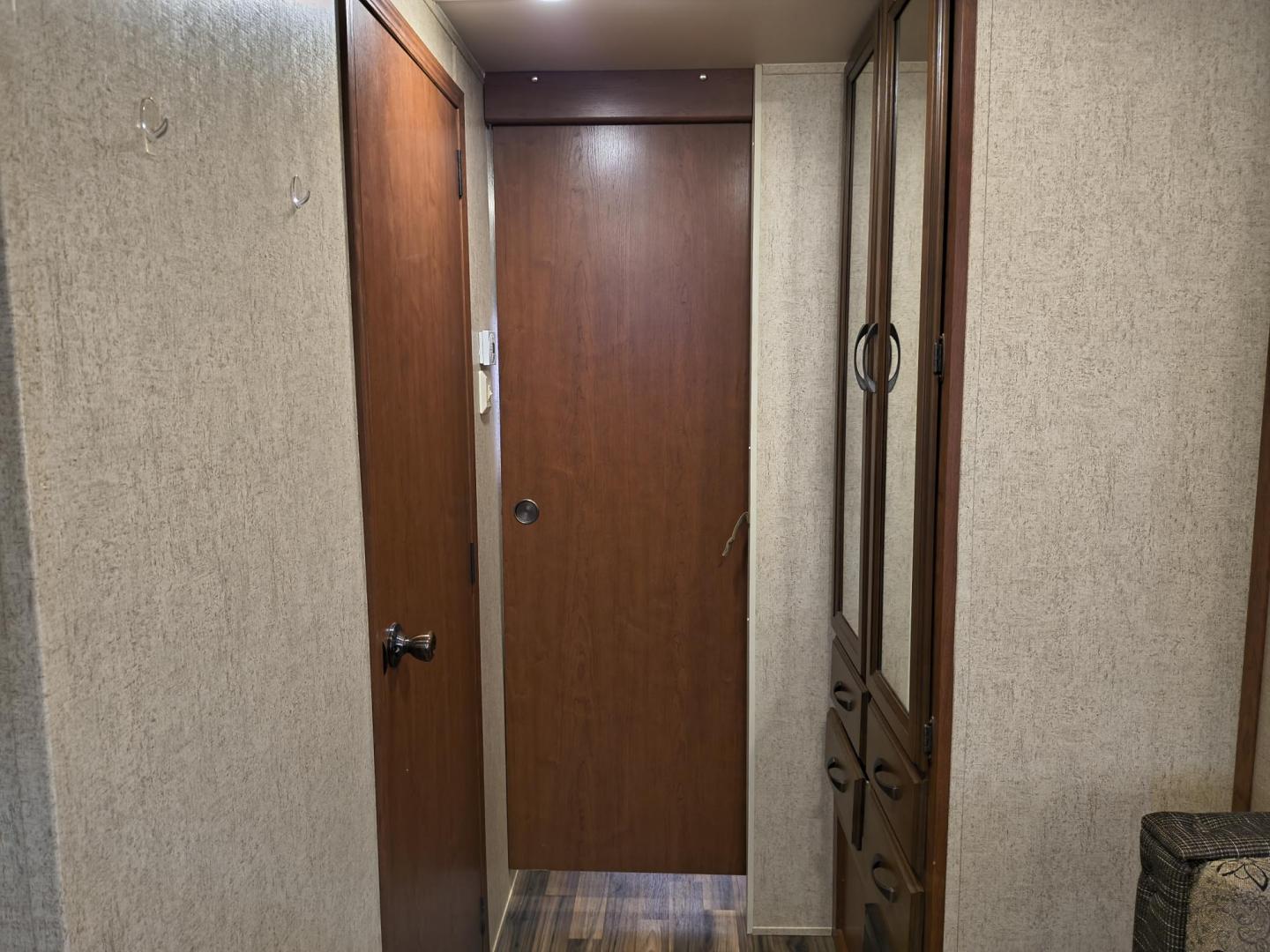 2015 White /BROWN Forest River PUMA 31BHSS 31BHSS (4X4TPUG23FP) , located at 17760 Hwy 62, Morris, OK, 74445, 35.609104, -95.877060 - CAMPING SEASON IS RIGHT AROUND THE CORNER SO CHECK OUT THIS 2015 FOREST RIVER PUMA 31BHSS 34.5FT OVERALL WITH 15FT POWER AWNING. IN THE FRONT IS THE MASTER BEDROOM WITH A QUEEN SIZE BED, STORAGE UNDER THE BED, TWO WARDROBE CLOSETS, AND OVERHEAD CABINETS. IN THE LIVING AND KITCHEN AREA THERE IS A ENT - Photo#14