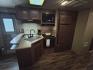 2015 White /BROWN Forest River PUMA 31BHSS 31BHSS (4X4TPUG23FP) , located at 17760 Hwy 62, Morris, OK, 74445, 35.609104, -95.877060 - CAMPING SEASON IS RIGHT AROUND THE CORNER SO CHECK OUT THIS 2015 FOREST RIVER PUMA 31BHSS 34.5FT OVERALL WITH 15FT POWER AWNING. IN THE FRONT IS THE MASTER BEDROOM WITH A QUEEN SIZE BED, STORAGE UNDER THE BED, TWO WARDROBE CLOSETS, AND OVERHEAD CABINETS. IN THE LIVING AND KITCHEN AREA THERE IS A ENT - Photo#22