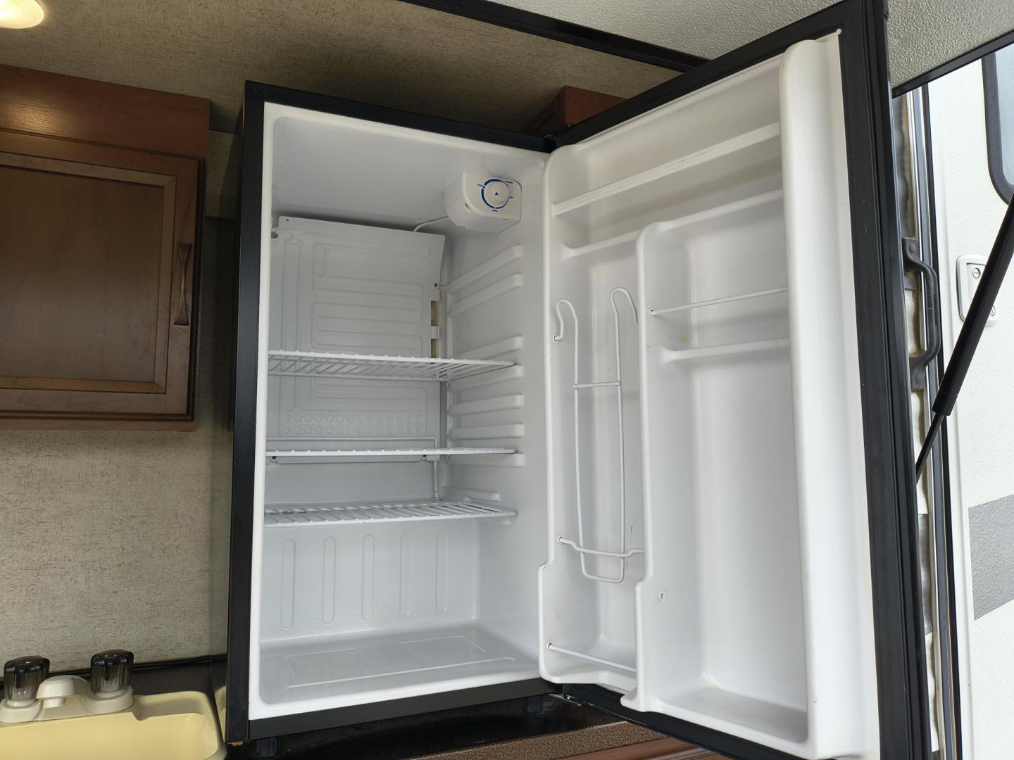 2015 White /BROWN Forest River PUMA 31BHSS 31BHSS (4X4TPUG23FP) , located at 17760 Hwy 62, Morris, OK, 74445, 35.609104, -95.877060 - CAMPING SEASON IS RIGHT AROUND THE CORNER SO CHECK OUT THIS 2015 FOREST RIVER PUMA 31BHSS 34.5FT OVERALL WITH 15FT POWER AWNING. IN THE FRONT IS THE MASTER BEDROOM WITH A QUEEN SIZE BED, STORAGE UNDER THE BED, TWO WARDROBE CLOSETS, AND OVERHEAD CABINETS. IN THE LIVING AND KITCHEN AREA THERE IS A ENT - Photo#46