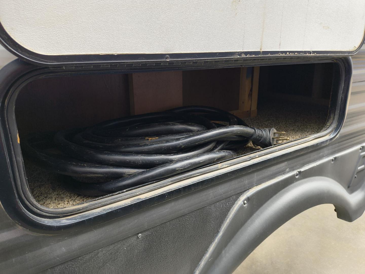 2015 White /BROWN Forest River PUMA 31BHSS 31BHSS (4X4TPUG23FP) , located at 17760 Hwy 62, Morris, OK, 74445, 35.609104, -95.877060 - CAMPING SEASON IS RIGHT AROUND THE CORNER SO CHECK OUT THIS 2015 FOREST RIVER PUMA 31BHSS 34.5FT OVERALL WITH 15FT POWER AWNING. IN THE FRONT IS THE MASTER BEDROOM WITH A QUEEN SIZE BED, STORAGE UNDER THE BED, TWO WARDROBE CLOSETS, AND OVERHEAD CABINETS. IN THE LIVING AND KITCHEN AREA THERE IS A ENT - Photo#53