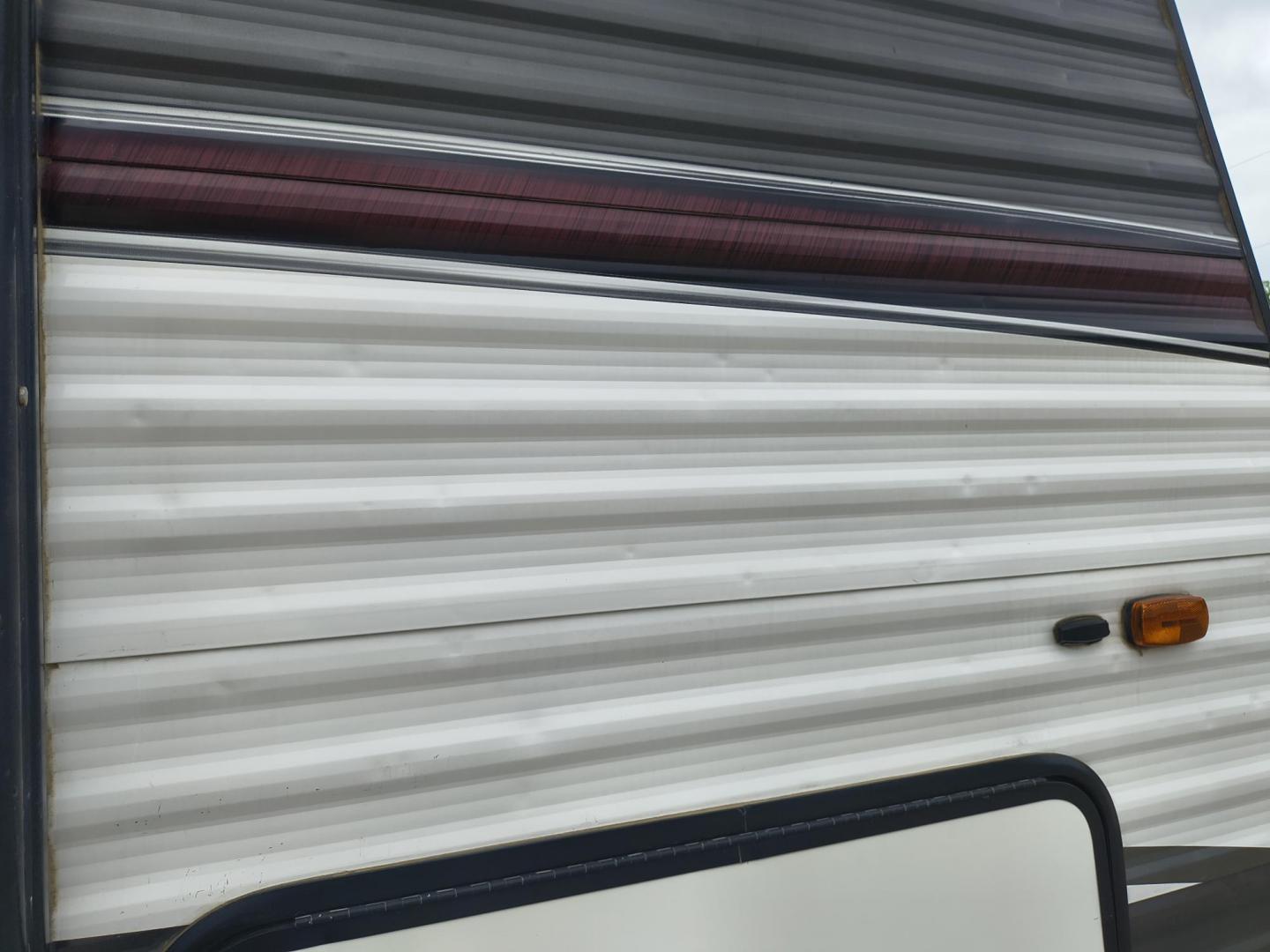 2015 White /BROWN Forest River PUMA 31BHSS 31BHSS (4X4TPUG23FP) , located at 17760 Hwy 62, Morris, OK, 74445, 35.609104, -95.877060 - CAMPING SEASON IS RIGHT AROUND THE CORNER SO CHECK OUT THIS 2015 FOREST RIVER PUMA 31BHSS 34.5FT OVERALL WITH 15FT POWER AWNING. IN THE FRONT IS THE MASTER BEDROOM WITH A QUEEN SIZE BED, STORAGE UNDER THE BED, TWO WARDROBE CLOSETS, AND OVERHEAD CABINETS. IN THE LIVING AND KITCHEN AREA THERE IS A ENT - Photo#58