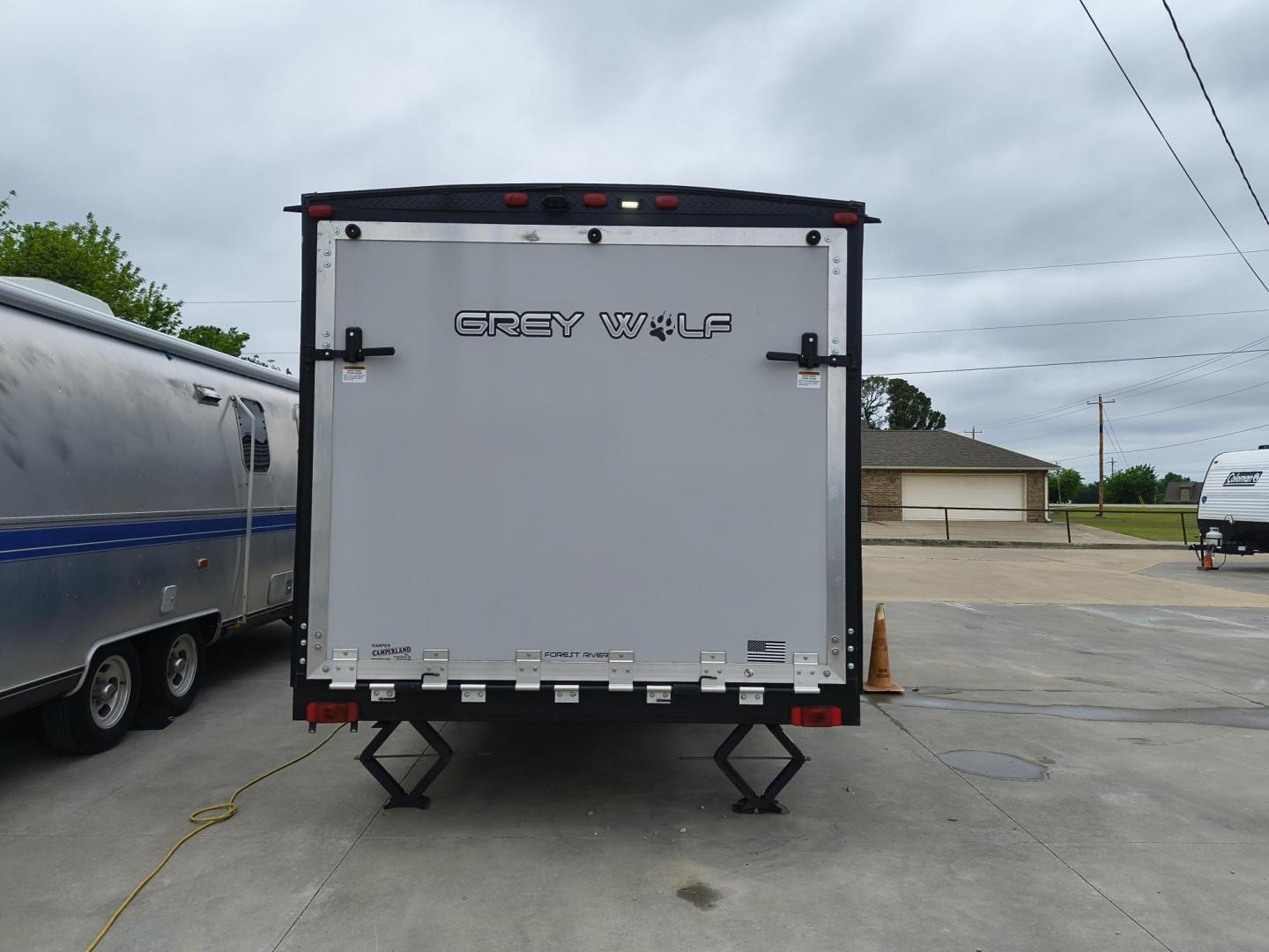 2022 Grey /Black Forest River 22RR - (4X4TCKX20NK) , located at 17760 Hwy 62, Morris, OK, 74445, 35.609104, -95.877060 - SPRING HAS SPRUNG AND SUMMER IS ON THE WAY!!! BIKERS WILL ENJOY THIS TOY HAULER. IT IS READY TO HIT THE ROAD AND ENJOY YOUR SUMMER. THIS CAMPER IS 30FT OVERALL HAS A QUEEN SIZED MASTER BED WITH A CLOSET WARDROBE ON EACH SIDE AND TV MOUNT. THE BATHROOM HAS A STANDUP ENCLOSED SHOWER WITH SINK AND VANI - Photo#3