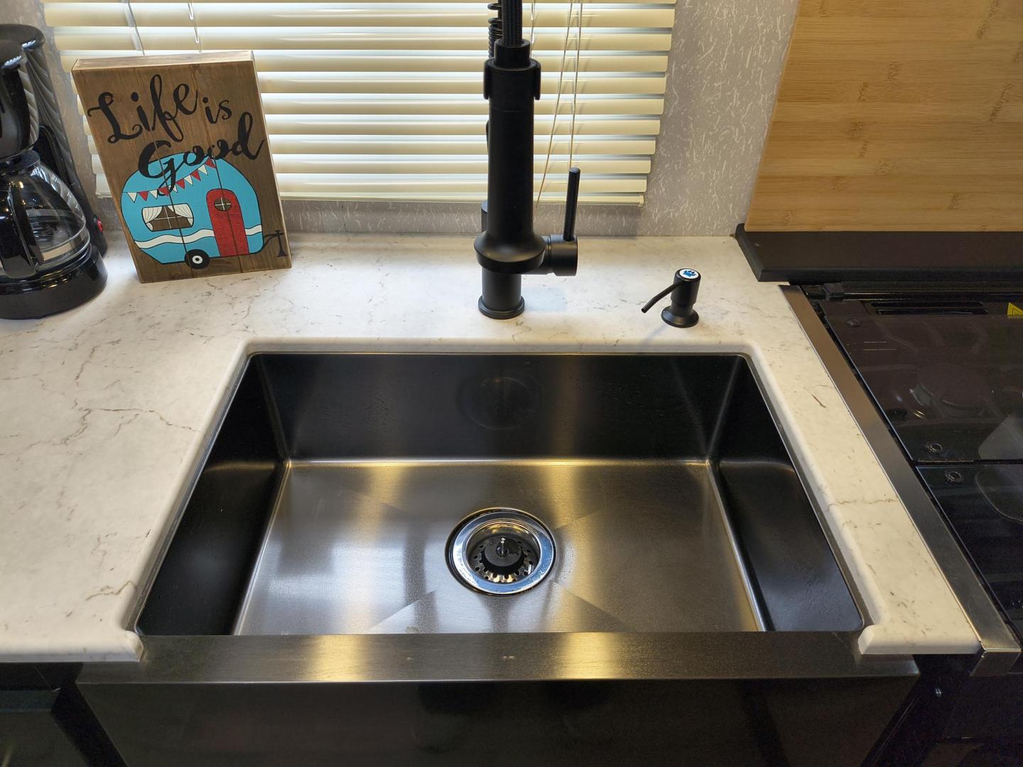 2022 Grey /Black Forest River 22RR - (4X4TCKX20NK) , located at 17760 Hwy 62, Morris, OK, 74445, 35.609104, -95.877060 - SPRING HAS SPRUNG AND SUMMER IS ON THE WAY!!! BIKERS WILL ENJOY THIS TOY HAULER. IT IS READY TO HIT THE ROAD AND ENJOY YOUR SUMMER. THIS CAMPER IS 30FT OVERALL HAS A QUEEN SIZED MASTER BED WITH A CLOSET WARDROBE ON EACH SIDE AND TV MOUNT. THE BATHROOM HAS A STANDUP ENCLOSED SHOWER WITH SINK AND VANI - Photo#17