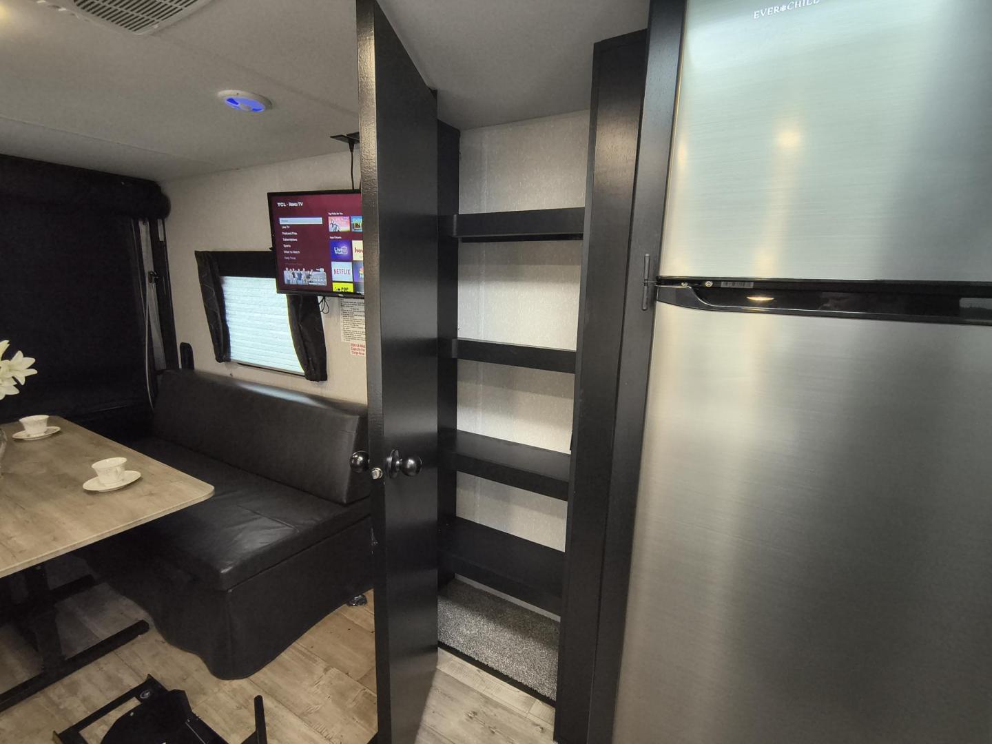 2022 Grey /Black Forest River 22RR - (4X4TCKX20NK) , located at 17760 Hwy 62, Morris, OK, 74445, 35.609104, -95.877060 - SPRING HAS SPRUNG AND SUMMER IS ON THE WAY!!! BIKERS WILL ENJOY THIS TOY HAULER. IT IS READY TO HIT THE ROAD AND ENJOY YOUR SUMMER. THIS CAMPER IS 30FT OVERALL HAS A QUEEN SIZED MASTER BED WITH A CLOSET WARDROBE ON EACH SIDE AND TV MOUNT. THE BATHROOM HAS A STANDUP ENCLOSED SHOWER WITH SINK AND VANI - Photo#27