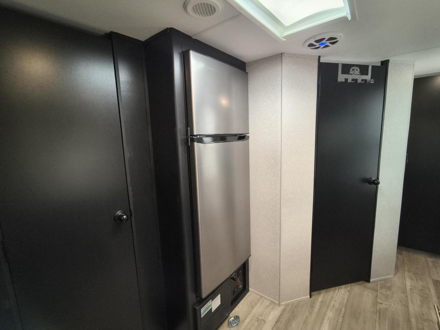 2022 Grey /Black Forest River 22RR - (4X4TCKX20NK) , located at 17760 Hwy 62, Morris, OK, 74445, 35.609104, -95.877060 - SPRING HAS SPRUNG AND SUMMER IS ON THE WAY!!! BIKERS WILL ENJOY THIS TOY HAULER. IT IS READY TO HIT THE ROAD AND ENJOY YOUR SUMMER. THIS CAMPER IS 30FT OVERALL HAS A QUEEN SIZED MASTER BED WITH A CLOSET WARDROBE ON EACH SIDE AND TV MOUNT. THE BATHROOM HAS A STANDUP ENCLOSED SHOWER WITH SINK AND VANI - Photo#28