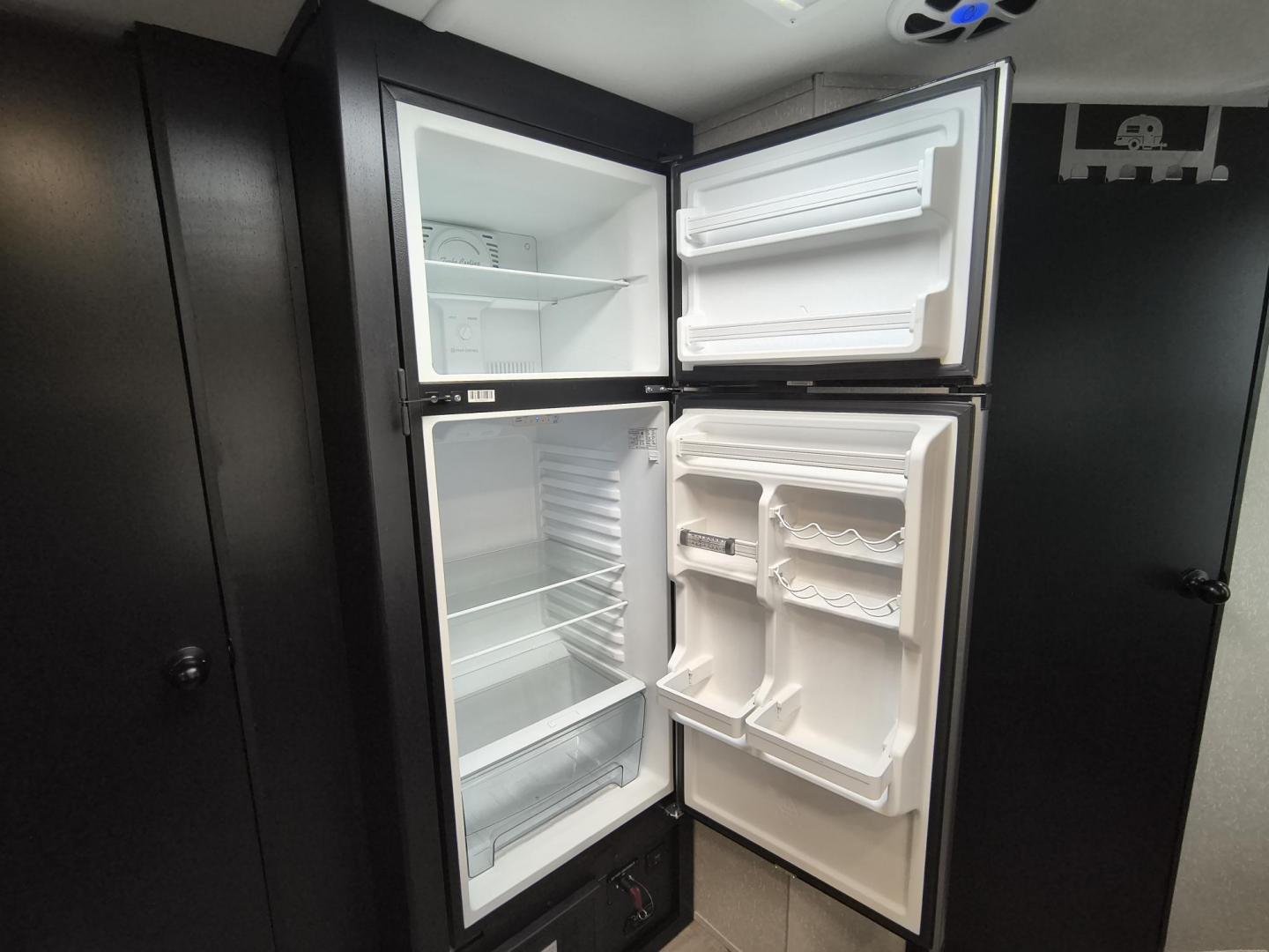 2022 Grey /Black Forest River 22RR - (4X4TCKX20NK) , located at 17760 Hwy 62, Morris, OK, 74445, 35.609104, -95.877060 - SPRING HAS SPRUNG AND SUMMER IS ON THE WAY!!! BIKERS WILL ENJOY THIS TOY HAULER. IT IS READY TO HIT THE ROAD AND ENJOY YOUR SUMMER. THIS CAMPER IS 30FT OVERALL HAS A QUEEN SIZED MASTER BED WITH A CLOSET WARDROBE ON EACH SIDE AND TV MOUNT. THE BATHROOM HAS A STANDUP ENCLOSED SHOWER WITH SINK AND VANI - Photo#29