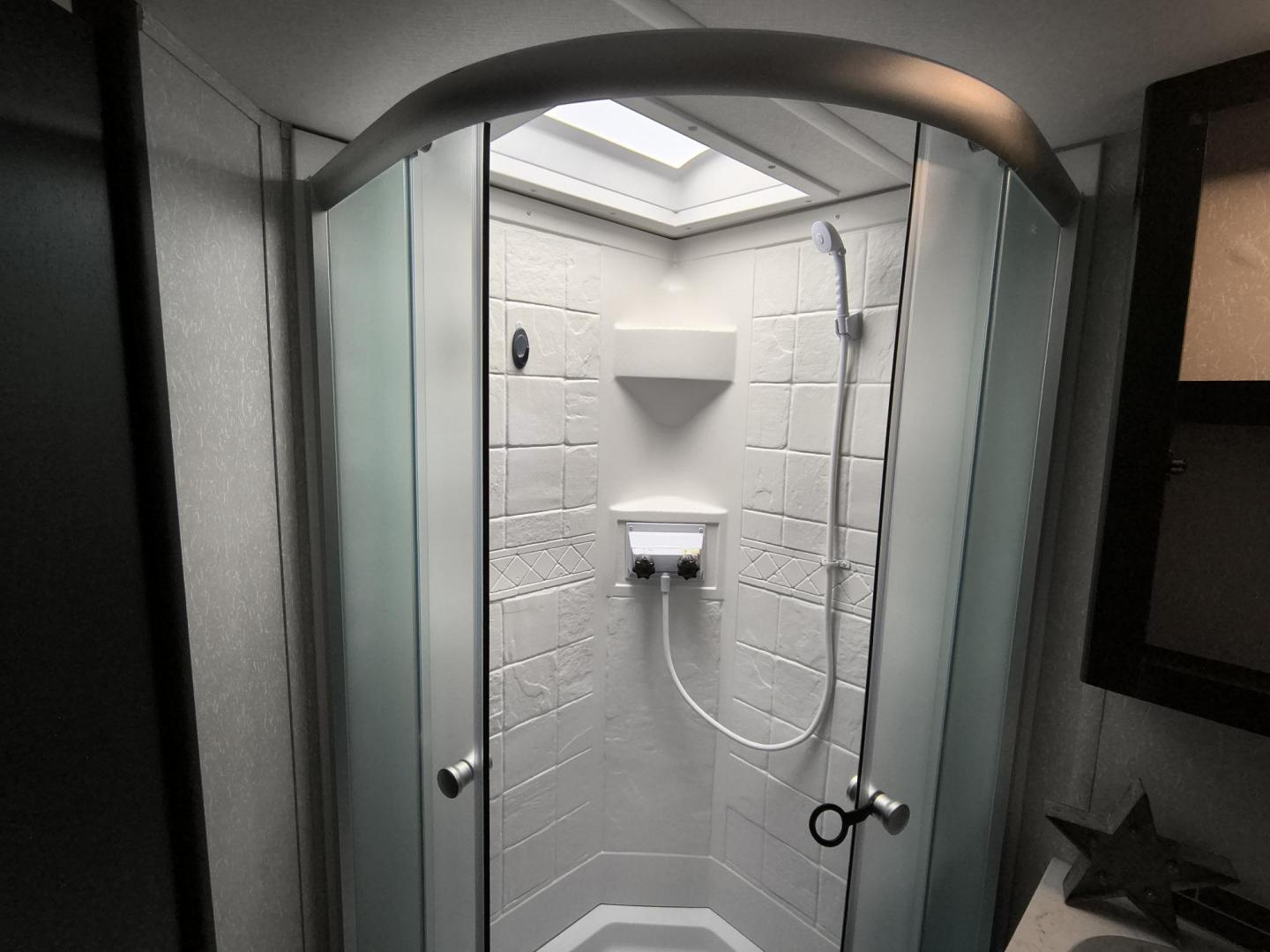 2022 Grey /Black Forest River 22RR - (4X4TCKX20NK) , located at 17760 Hwy 62, Morris, OK, 74445, 35.609104, -95.877060 - SPRING HAS SPRUNG AND SUMMER IS ON THE WAY!!! BIKERS WILL ENJOY THIS TOY HAULER. IT IS READY TO HIT THE ROAD AND ENJOY YOUR SUMMER. THIS CAMPER IS 30FT OVERALL HAS A QUEEN SIZED MASTER BED WITH A CLOSET WARDROBE ON EACH SIDE AND TV MOUNT. THE BATHROOM HAS A STANDUP ENCLOSED SHOWER WITH SINK AND VANI - Photo#35