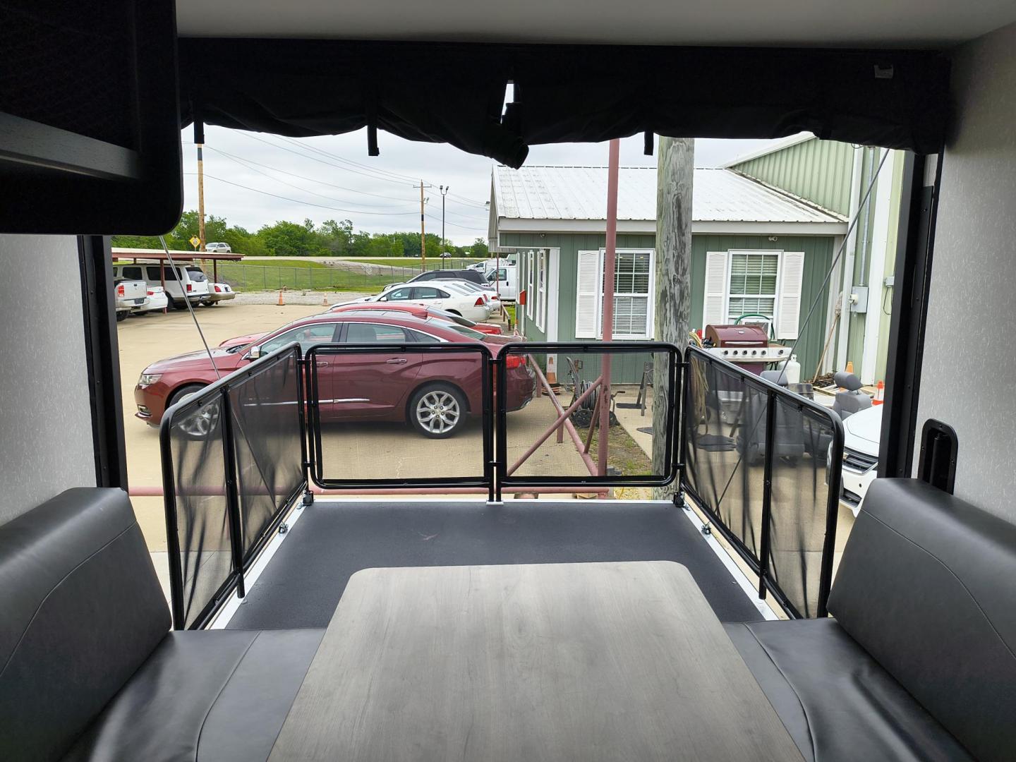 2022 Grey /Black Forest River 22RR - (4X4TCKX20NK) , located at 17760 Hwy 62, Morris, OK, 74445, 35.609104, -95.877060 - SPRING HAS SPRUNG AND SUMMER IS ON THE WAY!!! BIKERS WILL ENJOY THIS TOY HAULER. IT IS READY TO HIT THE ROAD AND ENJOY YOUR SUMMER. THIS CAMPER IS 30FT OVERALL HAS A QUEEN SIZED MASTER BED WITH A CLOSET WARDROBE ON EACH SIDE AND TV MOUNT. THE BATHROOM HAS A STANDUP ENCLOSED SHOWER WITH SINK AND VANI - Photo#41