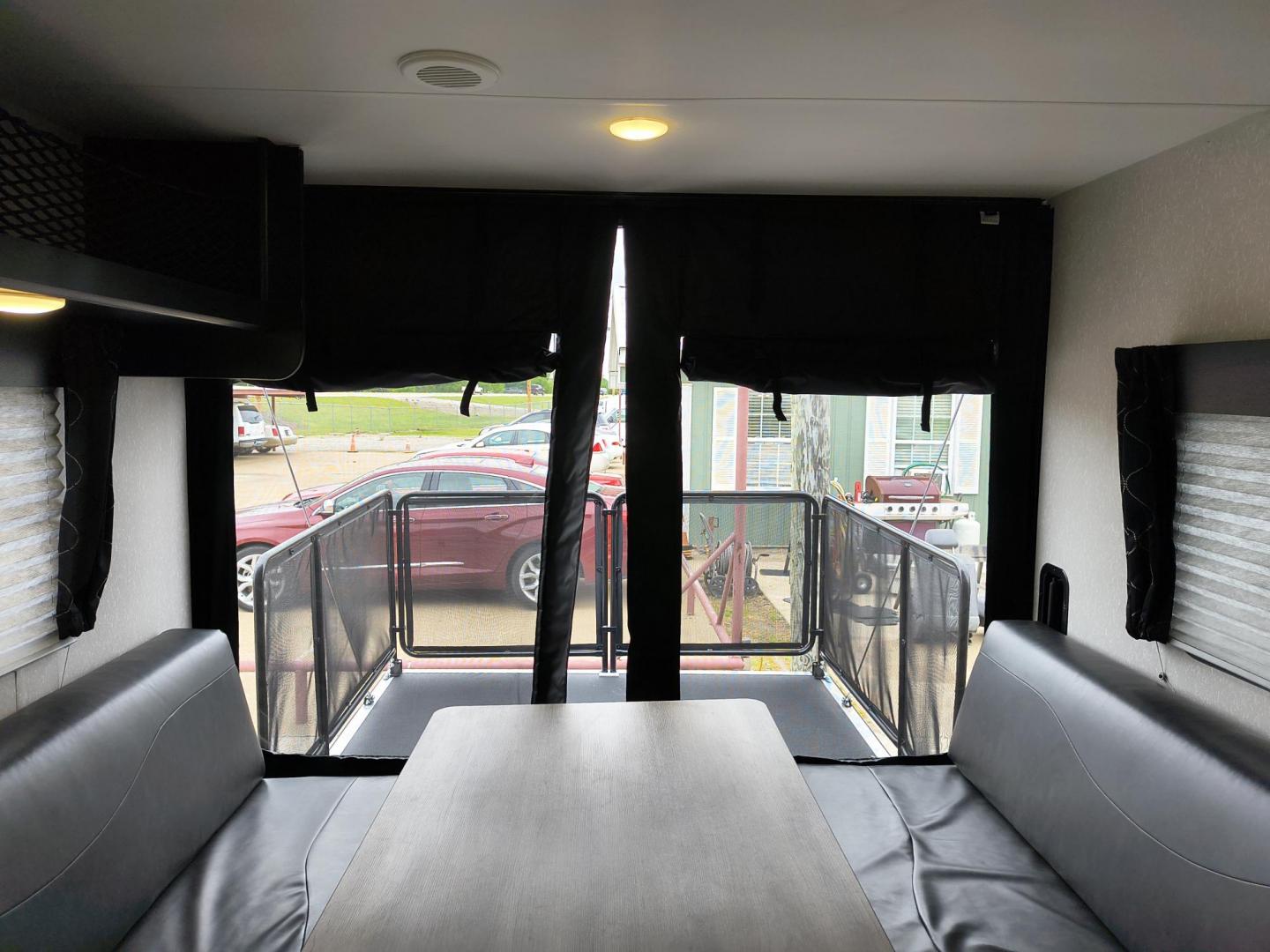 2022 Grey /Black Forest River 22RR - (4X4TCKX20NK) , located at 17760 Hwy 62, Morris, OK, 74445, 35.609104, -95.877060 - SPRING HAS SPRUNG AND SUMMER IS ON THE WAY!!! BIKERS WILL ENJOY THIS TOY HAULER. IT IS READY TO HIT THE ROAD AND ENJOY YOUR SUMMER. THIS CAMPER IS 30FT OVERALL HAS A QUEEN SIZED MASTER BED WITH A CLOSET WARDROBE ON EACH SIDE AND TV MOUNT. THE BATHROOM HAS A STANDUP ENCLOSED SHOWER WITH SINK AND VANI - Photo#43