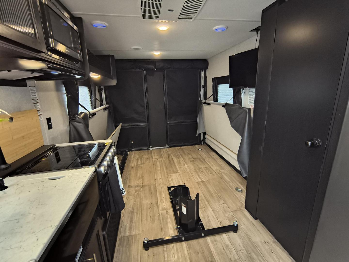 2022 Grey /Black Forest River 22RR - (4X4TCKX20NK) , located at 17760 Hwy 62, Morris, OK, 74445, 35.609104, -95.877060 - SPRING HAS SPRUNG AND SUMMER IS ON THE WAY!!! BIKERS WILL ENJOY THIS TOY HAULER. IT IS READY TO HIT THE ROAD AND ENJOY YOUR SUMMER. THIS CAMPER IS 30FT OVERALL HAS A QUEEN SIZED MASTER BED WITH A CLOSET WARDROBE ON EACH SIDE AND TV MOUNT. THE BATHROOM HAS A STANDUP ENCLOSED SHOWER WITH SINK AND VANI - Photo#48