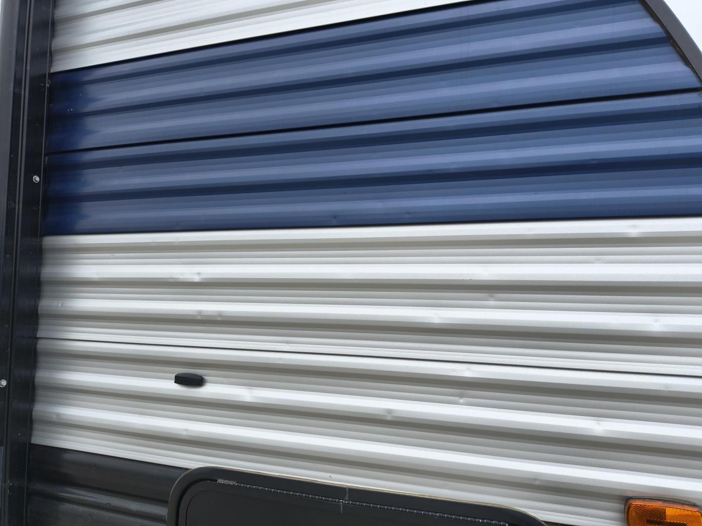 2022 Grey /Black Forest River 22RR - (4X4TCKX20NK) , located at 17760 Hwy 62, Morris, OK, 74445, 35.609104, -95.877060 - SPRING HAS SPRUNG AND SUMMER IS ON THE WAY!!! BIKERS WILL ENJOY THIS TOY HAULER. IT IS READY TO HIT THE ROAD AND ENJOY YOUR SUMMER. THIS CAMPER IS 30FT OVERALL HAS A QUEEN SIZED MASTER BED WITH A CLOSET WARDROBE ON EACH SIDE AND TV MOUNT. THE BATHROOM HAS A STANDUP ENCLOSED SHOWER WITH SINK AND VANI - Photo#50