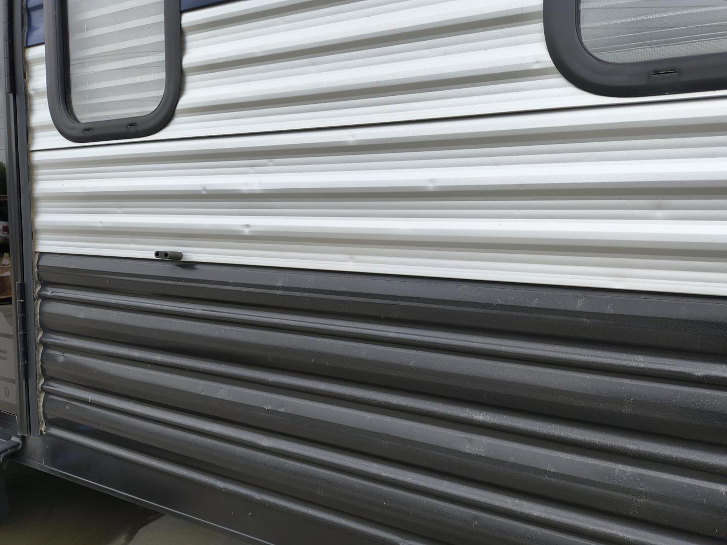 2022 Grey /Black Forest River 22RR - (4X4TCKX20NK) , located at 17760 Hwy 62, Morris, OK, 74445, 35.609104, -95.877060 - SPRING HAS SPRUNG AND SUMMER IS ON THE WAY!!! BIKERS WILL ENJOY THIS TOY HAULER. IT IS READY TO HIT THE ROAD AND ENJOY YOUR SUMMER. THIS CAMPER IS 30FT OVERALL HAS A QUEEN SIZED MASTER BED WITH A CLOSET WARDROBE ON EACH SIDE AND TV MOUNT. THE BATHROOM HAS A STANDUP ENCLOSED SHOWER WITH SINK AND VANI - Photo#51