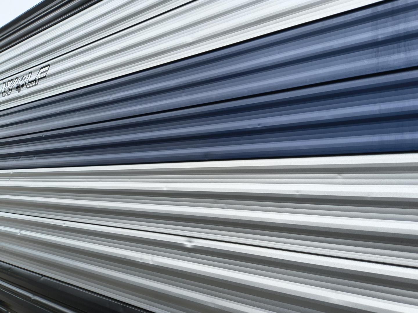 2022 Grey /Black Forest River 22RR - (4X4TCKX20NK) , located at 17760 Hwy 62, Morris, OK, 74445, 35.609104, -95.877060 - SPRING HAS SPRUNG AND SUMMER IS ON THE WAY!!! BIKERS WILL ENJOY THIS TOY HAULER. IT IS READY TO HIT THE ROAD AND ENJOY YOUR SUMMER. THIS CAMPER IS 30FT OVERALL HAS A QUEEN SIZED MASTER BED WITH A CLOSET WARDROBE ON EACH SIDE AND TV MOUNT. THE BATHROOM HAS A STANDUP ENCLOSED SHOWER WITH SINK AND VANI - Photo#54