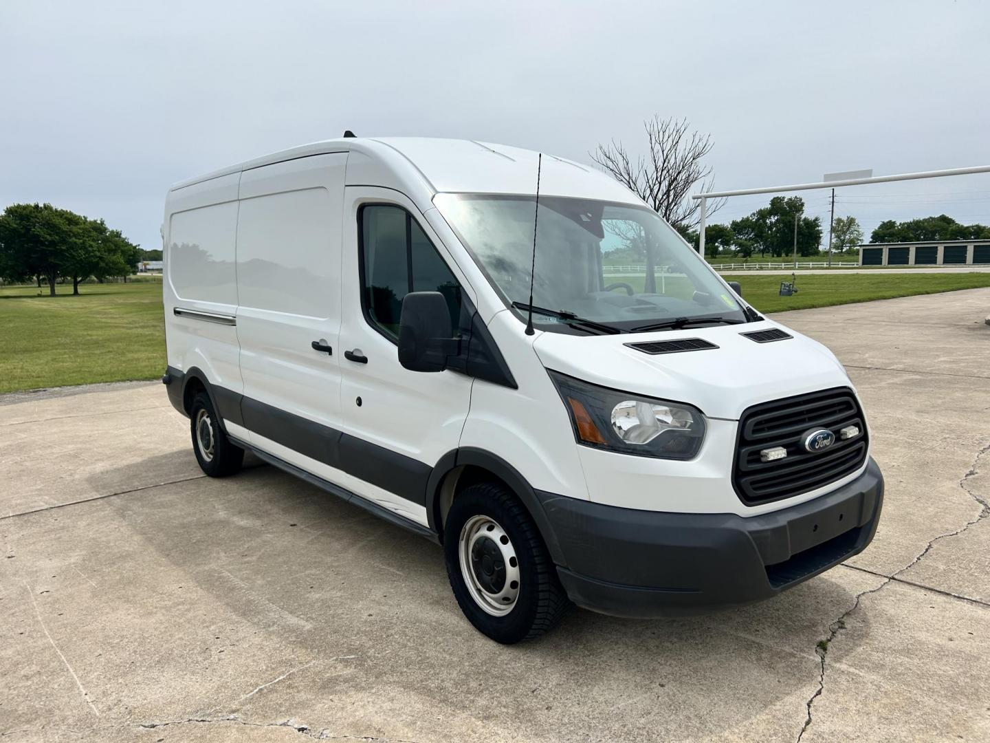 2017 White /GRAY Ford Transit 250 Van high Roof w/Sliding Pass. 148-in. WB (1FTYR2CM9HK) with an 3.7L V6 DOHC 24V engine, 6A transmission, located at 17760 Hwy 62, Morris, OK, 74445, (918) 733-4887, 35.609104, -95.877060 - 2017 FORD TRANSIT 250 HIGH TOP BI-FUEL SYSTEM RUNS ON CNG OR GASOLINE HAS THE 3.7L V6 ENIGINE. ***CLEAN TITLE*** IT FEATURES KEYLESS ENTRY, CLOTH INTERIOR, MANUAL SEATS, POWER WINDOWS, POWER LOCKS, POWER MIRRORS, CRUISE CONTROL, HANDS FREE CALLING, AM/FM RADIO, SIRIUS RADIO, BLUETOOTH RADIO, BACKUP - Photo#2