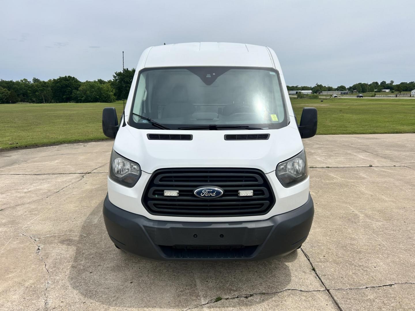 2017 White /GRAY Ford Transit 250 Van high Roof w/Sliding Pass. 148-in. WB (1FTYR2CM9HK) with an 3.7L V6 DOHC 24V engine, 6A transmission, located at 17760 Hwy 62, Morris, OK, 74445, (918) 733-4887, 35.609104, -95.877060 - 2017 FORD TRANSIT 250 HIGH TOP BI-FUEL SYSTEM RUNS ON CNG OR GASOLINE HAS THE 3.7L V6 ENIGINE. ***CLEAN TITLE*** IT FEATURES KEYLESS ENTRY, CLOTH INTERIOR, MANUAL SEATS, POWER WINDOWS, POWER LOCKS, POWER MIRRORS, CRUISE CONTROL, HANDS FREE CALLING, AM/FM RADIO, SIRIUS RADIO, BLUETOOTH RADIO, BACKUP - Photo#1