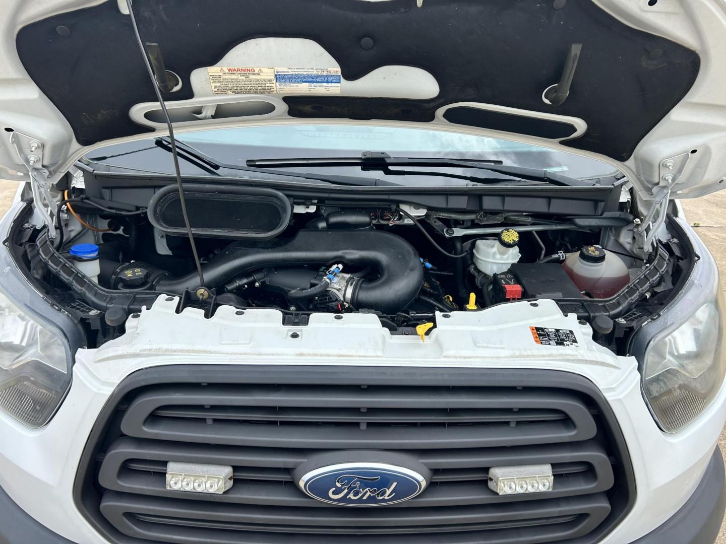 2017 White /GRAY Ford Transit 250 Van high Roof w/Sliding Pass. 148-in. WB (1FTYR2CM9HK) with an 3.7L V6 DOHC 24V engine, 6A transmission, located at 17760 Hwy 62, Morris, OK, 74445, (918) 733-4887, 35.609104, -95.877060 - 2017 FORD TRANSIT 250 HIGH TOP BI-FUEL SYSTEM RUNS ON CNG OR GASOLINE HAS THE 3.7L V6 ENIGINE. ***CLEAN TITLE*** IT FEATURES KEYLESS ENTRY, CLOTH INTERIOR, MANUAL SEATS, POWER WINDOWS, POWER LOCKS, POWER MIRRORS, CRUISE CONTROL, HANDS FREE CALLING, AM/FM RADIO, SIRIUS RADIO, BLUETOOTH RADIO, BACKUP - Photo#24