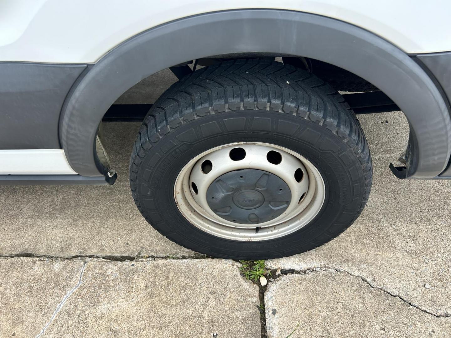 2017 White /GRAY Ford Transit 250 Van high Roof w/Sliding Pass. 148-in. WB (1FTYR2CM9HK) with an 3.7L V6 DOHC 24V engine, 6A transmission, located at 17760 Hwy 62, Morris, OK, 74445, (918) 733-4887, 35.609104, -95.877060 - 2017 FORD TRANSIT 250 HIGH TOP BI-FUEL SYSTEM RUNS ON CNG OR GASOLINE HAS THE 3.7L V6 ENIGINE. ***CLEAN TITLE*** IT FEATURES KEYLESS ENTRY, CLOTH INTERIOR, MANUAL SEATS, POWER WINDOWS, POWER LOCKS, POWER MIRRORS, CRUISE CONTROL, HANDS FREE CALLING, AM/FM RADIO, SIRIUS RADIO, BLUETOOTH RADIO, BACKUP - Photo#33