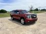 2015 RED /TAN Chevrolet Suburban LT 1500 2WD (1GNSCJKC1FR) with an 5.3L V8 OHV 16V engine, 6-Speed Automatic transmission, located at 17760 Hwy 62, Morris, OK, 74445, (918) 733-4887, 35.609104, -95.877060 - 2015 CHEVY SUBURBAN HAS A 5.3L V8 ENGINE AND IS RWD. POWER LOCKS, POWER WINDOWS, POWER SEATS. PUSH BUTTON START, KEYLESS ENTRY. AM/FM STEREO, SATALITE RADIO, CD PLAYER. EQUIPPED WITH NICE LEATHER SEATS, DUAL AIR, BLUETOOTH, CRUISE CONTROL. HEATED SEATS FRONT AND REAR, ALSO A HEATED STEERING WHEEL - Photo#3