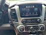 2015 RED /TAN Chevrolet Suburban LT 1500 2WD (1GNSCJKC1FR) with an 5.3L V8 OHV 16V engine, 6-Speed Automatic transmission, located at 17760 Hwy 62, Morris, OK, 74445, (918) 733-4887, 35.609104, -95.877060 - 2015 CHEVY SUBURBAN HAS A 5.3L V8 ENGINE AND IS RWD. POWER LOCKS, POWER WINDOWS, POWER SEATS. PUSH BUTTON START, KEYLESS ENTRY. AM/FM STEREO, SATALITE RADIO, CD PLAYER. EQUIPPED WITH NICE LEATHER SEATS, DUAL AIR, BLUETOOTH, CRUISE CONTROL. HEATED SEATS FRONT AND REAR, ALSO A HEATED STEERING WHEEL - Photo#11