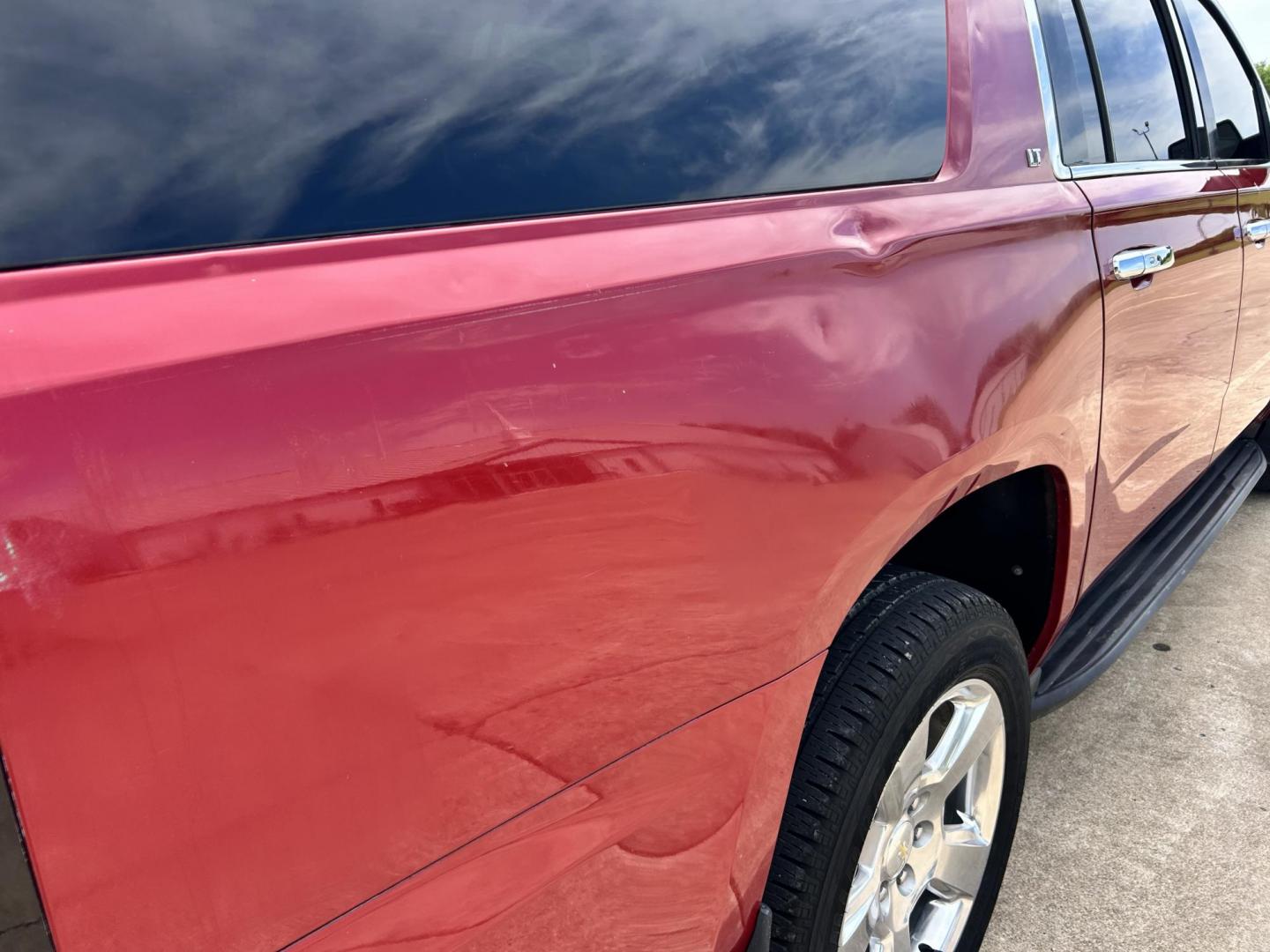 2015 RED /TAN Chevrolet Suburban LT 1500 2WD (1GNSCJKC1FR) with an 5.3L V8 OHV 16V engine, 6-Speed Automatic transmission, located at 17760 Hwy 62, Morris, OK, 74445, (918) 733-4887, 35.609104, -95.877060 - 2015 CHEVY SUBURBAN HAS A 5.3L V8 ENGINE AND IS RWD. POWER LOCKS, POWER WINDOWS, POWER SEATS. PUSH BUTTON START, KEYLESS ENTRY. AM/FM STEREO, SATALITE RADIO, CD PLAYER. EQUIPPED WITH NICE LEATHER SEATS, DUAL AIR, BLUETOOTH, CRUISE CONTROL. HEATED SEATS FRONT AND REAR, ALSO A HEATED STEERING WHEEL - Photo#31