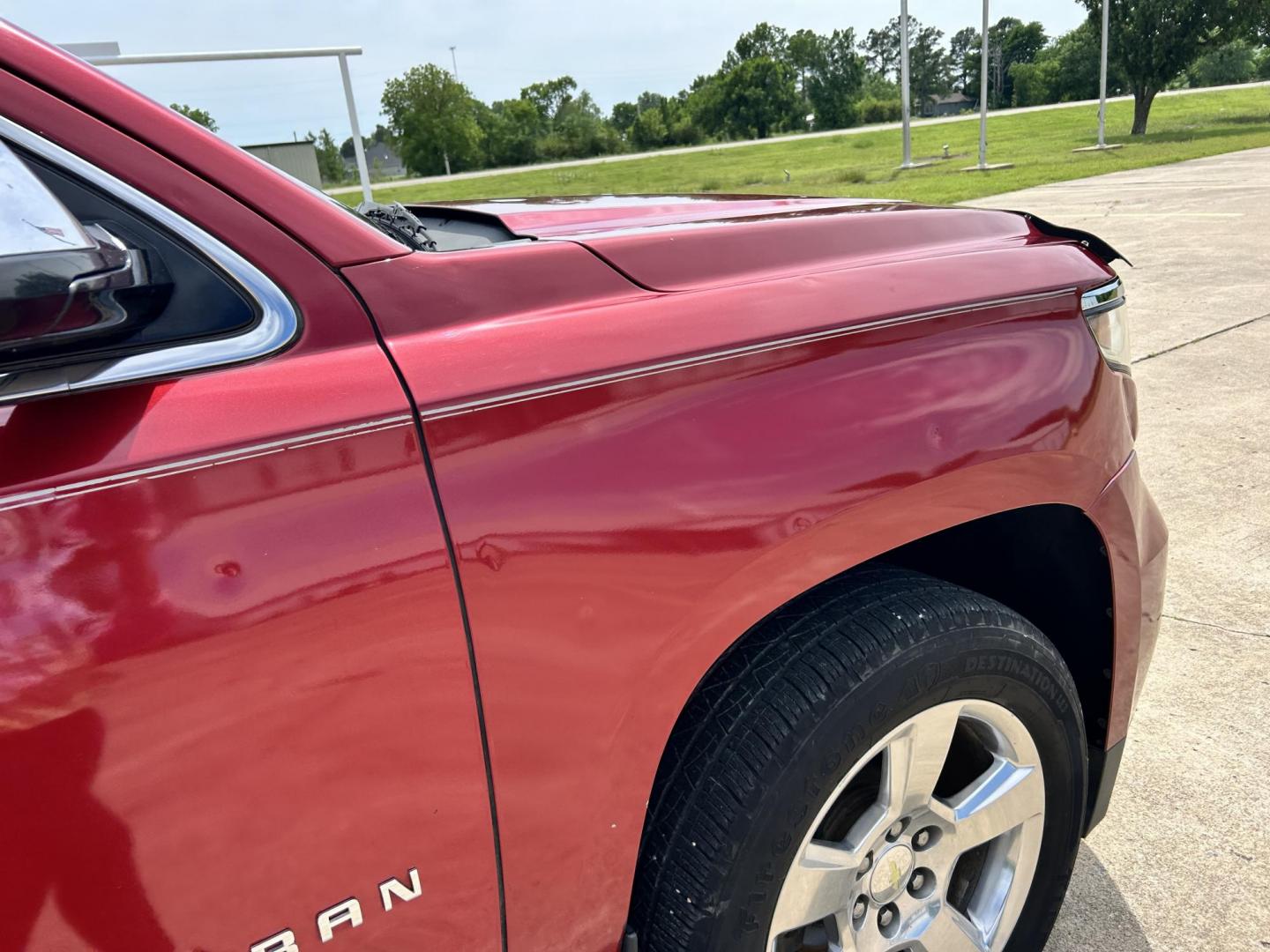 2015 RED /TAN Chevrolet Suburban LT 1500 2WD (1GNSCJKC1FR) with an 5.3L V8 OHV 16V engine, 6-Speed Automatic transmission, located at 17760 Hwy 62, Morris, OK, 74445, (918) 733-4887, 35.609104, -95.877060 - 2015 CHEVY SUBURBAN HAS A 5.3L V8 ENGINE AND IS RWD. POWER LOCKS, POWER WINDOWS, POWER SEATS. PUSH BUTTON START, KEYLESS ENTRY. AM/FM STEREO, SATALITE RADIO, CD PLAYER. EQUIPPED WITH NICE LEATHER SEATS, DUAL AIR, BLUETOOTH, CRUISE CONTROL. HEATED SEATS FRONT AND REAR, ALSO A HEATED STEERING WHEEL - Photo#33