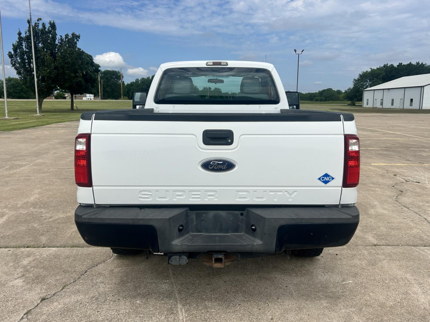 2013 White /Gray Ford F-250 SD (1FTBF2B69DE) with an 6.2L V8 OHV 16V engine, 6-Speed Automatic transmission, located at 17760 Hwy 62, Morris, OK, 74445, (918) 733-4887, 35.609104, -95.877060 - 2013 F250 4WD SUPER DUTY HAS THE 6.2L V8 ENGINE. THIS IS A DEDICATED CNG ONLY RUNS ON COMPRESSED NATURAL GAS. ***CLEAN TITLE*** THIS FEATURES LEATHER SEATS, MANUAL SEATS, MANUAL WINDOWS, MANUAL LOCKS, MANUAL MIRRORS, AM/FM RADIO, CRUISE CONTROL, TRACTION CONTROL, TRAILER BRAKES, AND TRAILER HITCH. - Photo#5