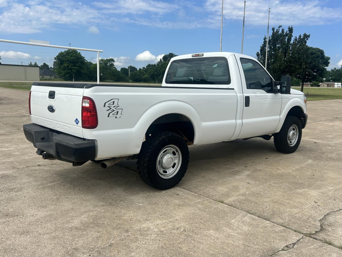 2013 White /Gray Ford F-250 SD (1FTBF2B69DE) with an 6.2L V8 OHV 16V engine, 6-Speed Automatic transmission, located at 17760 Hwy 62, Morris, OK, 74445, (918) 733-4887, 35.609104, -95.877060 - 2013 F250 4WD SUPER DUTY HAS THE 6.2L V8 ENGINE. THIS IS A DEDICATED CNG ONLY RUNS ON COMPRESSED NATURAL GAS. ***CLEAN TITLE*** THIS FEATURES LEATHER SEATS, MANUAL SEATS, MANUAL WINDOWS, MANUAL LOCKS, MANUAL MIRRORS, AM/FM RADIO, CRUISE CONTROL, TRACTION CONTROL, TRAILER BRAKES, AND TRAILER HITCH. - Photo#4