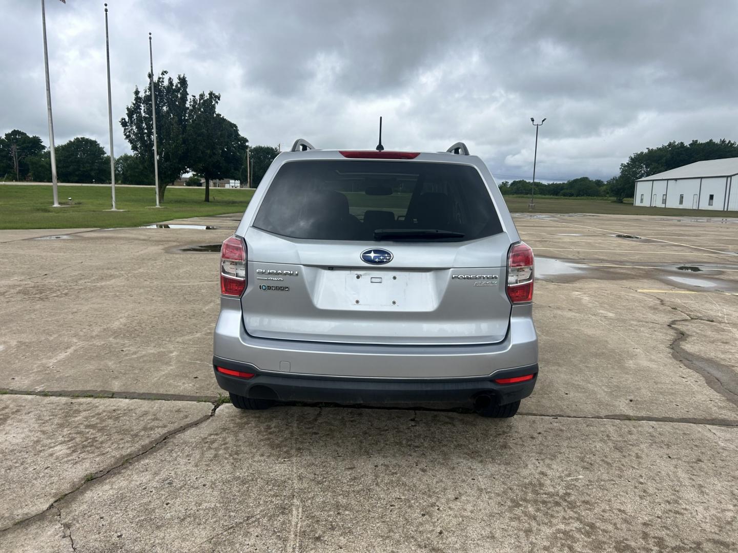 2015 Silver /BLACK Subaru Forester (JF2SJADC9FH) with an 2.5L H4 SOHC 16V engine, 6-Speed Automatic transmission, located at 17760 Hwy 62, Morris, OK, 74445, (918) 733-4887, 35.609104, -95.877060 - 2015 SUBARU FORESTER AWD WITH THE 2.5L ENGINE. IT FEATURES CLOTH INTERIOR, POWER AND HEATED SEATS, POWER WINDOWS, POWER LOCKS, POWER MIRRORS, MULTI STEERING CONTROLS, CRUISE CONTROL, HANDS FREE CALLING, AM/FM RADIO, CD PLAYER, AUXILARY PORT, BACKUP CAMERA, BACK SEATS THAT FOLD FOR CARGO SPACE, AND - Photo#5