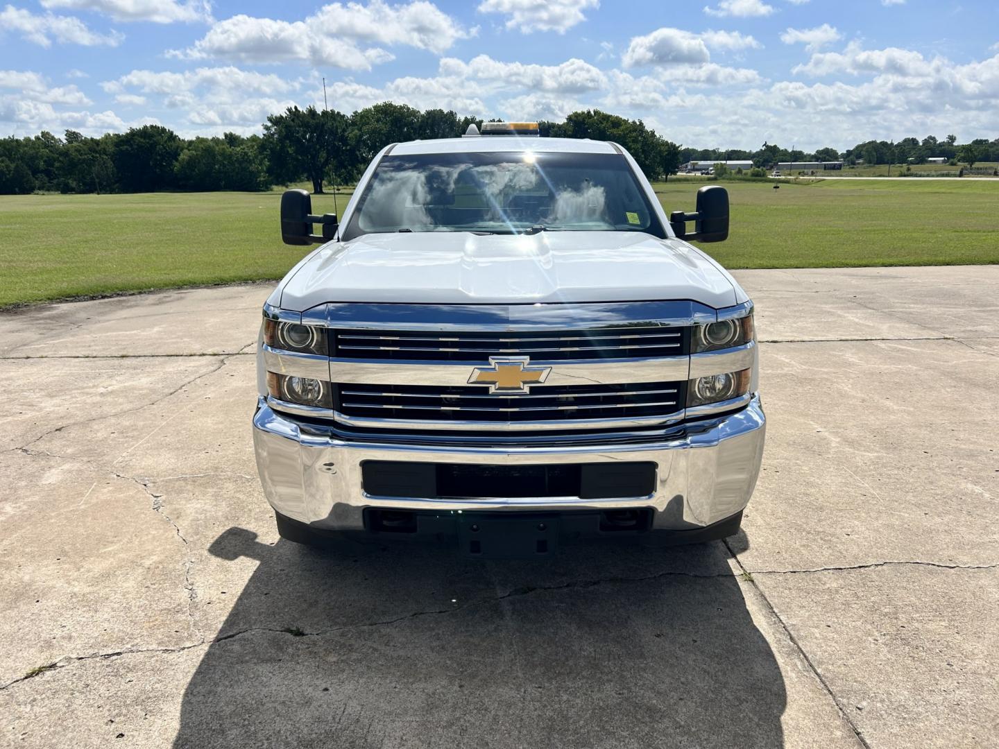 2016 White /Gray Chevrolet Silverado 2500HD Work Truck Double Cab 2WD (1GC2CUEG7GZ) with an 6.0L V8 OHV 16V FFV engine, 6A transmission, located at 17760 Hwy 62, Morris, OK, 74445, (918) 733-4887, 35.609104, -95.877060 - 2016 CHEVY SILVERADO 2500 HD 2WD BI-FUEL SYSTEM THAT RUNS ON CNG OR GASOLINE WITH 6.0L V8 ENIGINE. IT FEATURES POWER LOCKS, POWER WINDOWS, MANUAL SEATS, CLOTH INTERIOR, CRUSIE CONTROL, TRACTION CONTROL, TRAILER BRAKES, AM/FM RADIO, NO BACK SEAT HAS OPEN TOOL BOX, AND TOOL BED. ONLY 147,236 MILES WIT - Photo#2