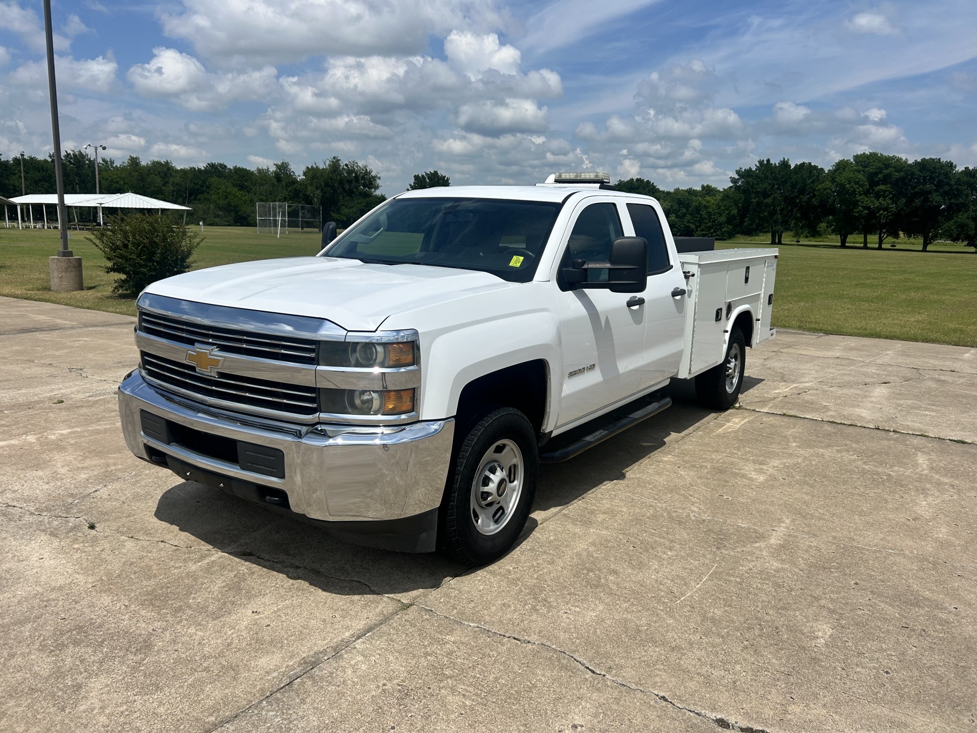 photo of 2015 Chevrolet Silverado 2500HD Work Truck Double Cab 2WD BI-FUEL SYSTEM RUNS ON CNG (COMPRESSED NATURAL GAS) OR GASOLINE $1390 TAX CREDIT AVAILABLE......SEE HOW OKLAHOMAN'S CAN OPERATE FOR LESS THAN $1.00 PER GALLON!!...HIT SHOW MORE BELOW IN OUR DESCRIP
