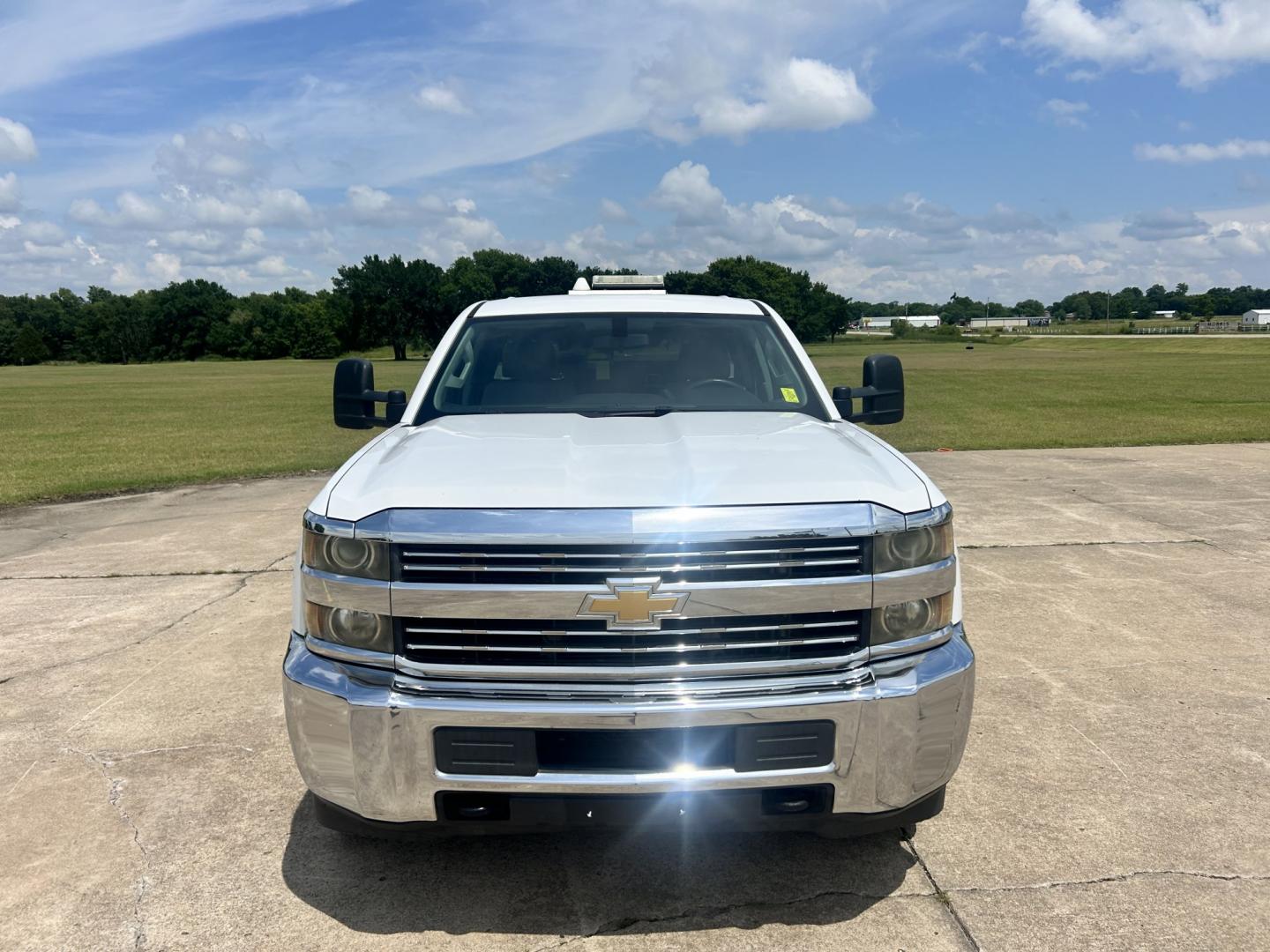 2015 White /GRAY Chevrolet Silverado 2500HD Work Truck Double Cab 2WD (1GC2CUEB5FZ) with an 6.0L V8 OHV 16V CNG engine, 6A transmission, located at 17760 Hwy 62, Morris, OK, 74445, (918) 733-4887, 35.609104, -95.877060 - 2015 CHEVY SILVERADO 1500 4WD BI-FUEL SYSTEM RUNS ON CNG OR GASOLINE WITH THE 5.3L V8 ENGINE. IT FEATURES MANUAL SEATS, CLOTH INTERIOR, POWER LOCKS, POWER WINDOWS, AM/FM RADIO, BACKUP CAMERA, CRUSIE CONTROL, TRACTION CONTROL, SAFETY LIGHT, AND WEATHER GUARD TOOL BOXES. ONLY 174,628 MILES WITH 265/70 - Photo#1