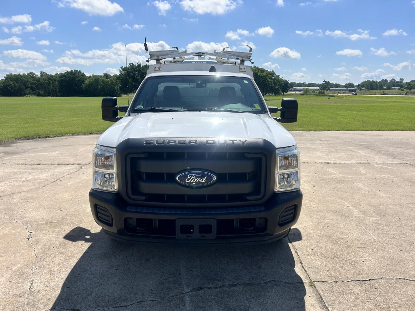 2013 White /GRAY Ford F-350 SD (1FDRF3A67DE) with an 6.2L V8 OHV 16V engine, 6-Speed Automatic transmission, located at 17760 Hwy 62, Morris, OK, 74445, (918) 733-4887, 35.609104, -95.877060 - 2013 FORD F-350 6.2 V8 RWD DEDICATED CNG ONLY RUNS ON COMPRESSED NATURAL GAS AND DOES NOT RUN ON GASOLINE. FEATURES MANUAL SEATS, MANUAL LOCKS, MANUAL WINDOWS, MANUAL MIRRORS, AM/FM STEREO, VINYL SEATS, CRUISE CONTROL, TRACTION CONTROL, FACTORY-EQUIPT TRAILER BREAKS, POWER CONVERTER, GASOLINE CUMMIN- Photo#2