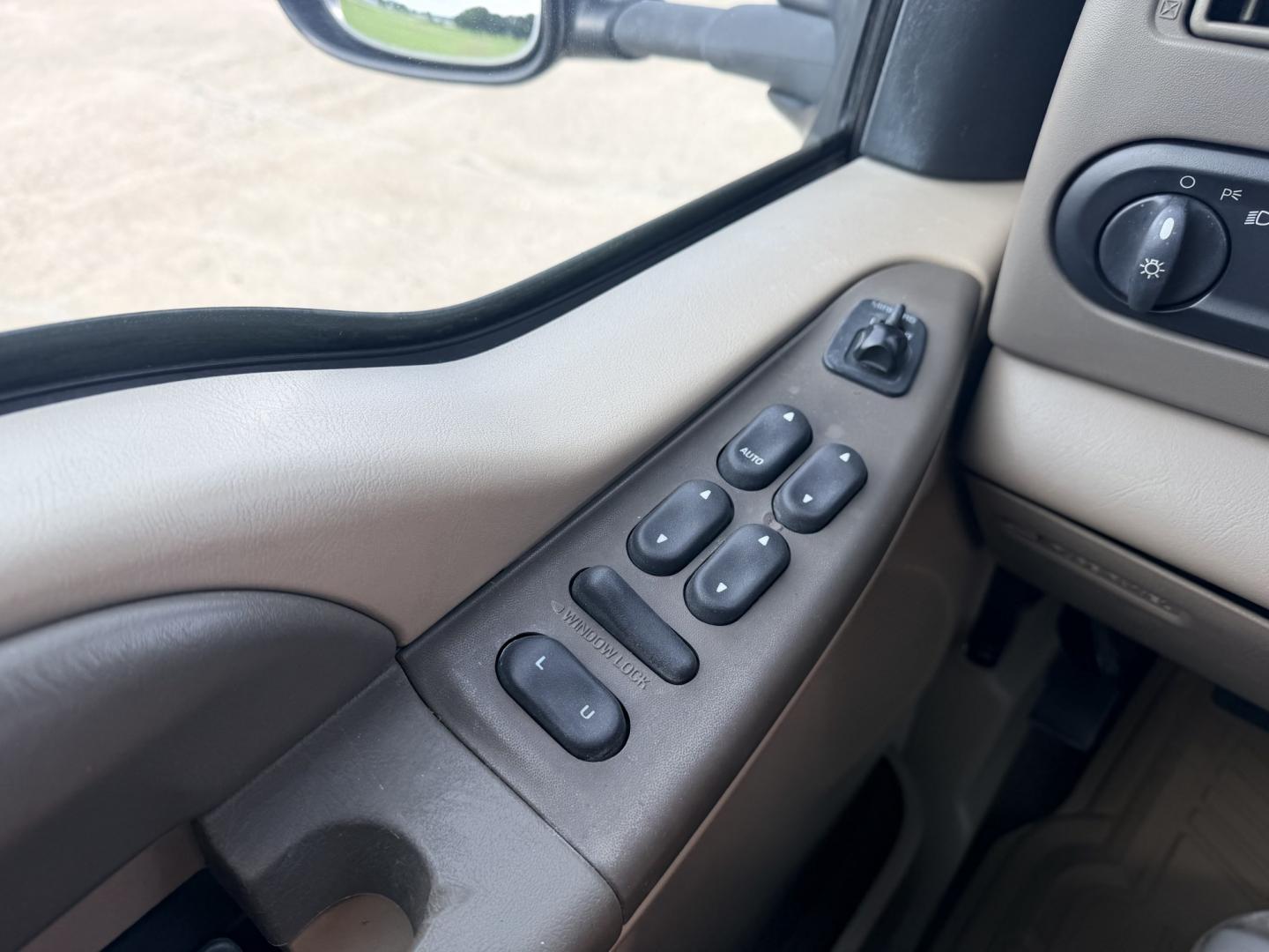2000 GOLD /TAN Ford Excursion XLT 2WD (1FMNU40SXYE) with an 6.8L V10 SOHC 20V engine, 4A OD transmission, located at 17760 Hwy 62, Morris, OK, 74445, (918) 733-4887, 35.609104, -95.877060 - 2000 FORD EXCURSION 2WD HAS 6.8L V10 ENGINE. FEATURING POWER LOCKS, POWER WINDOWS, POWER SEATS, POWER MIRRORS, CLOTH INTERIOR, AM/FM STEREO, CD PLAYER, CASSETTE PLAYER, REAR CLIMATE CONTROL, CRUISE CONTROL, AND 3RD ROW SEATING. TIRES LT265/75R16 TIRES AND 217,879 MILES. HAS A CLEAN TITLE. WE OFFER- Photo#9
