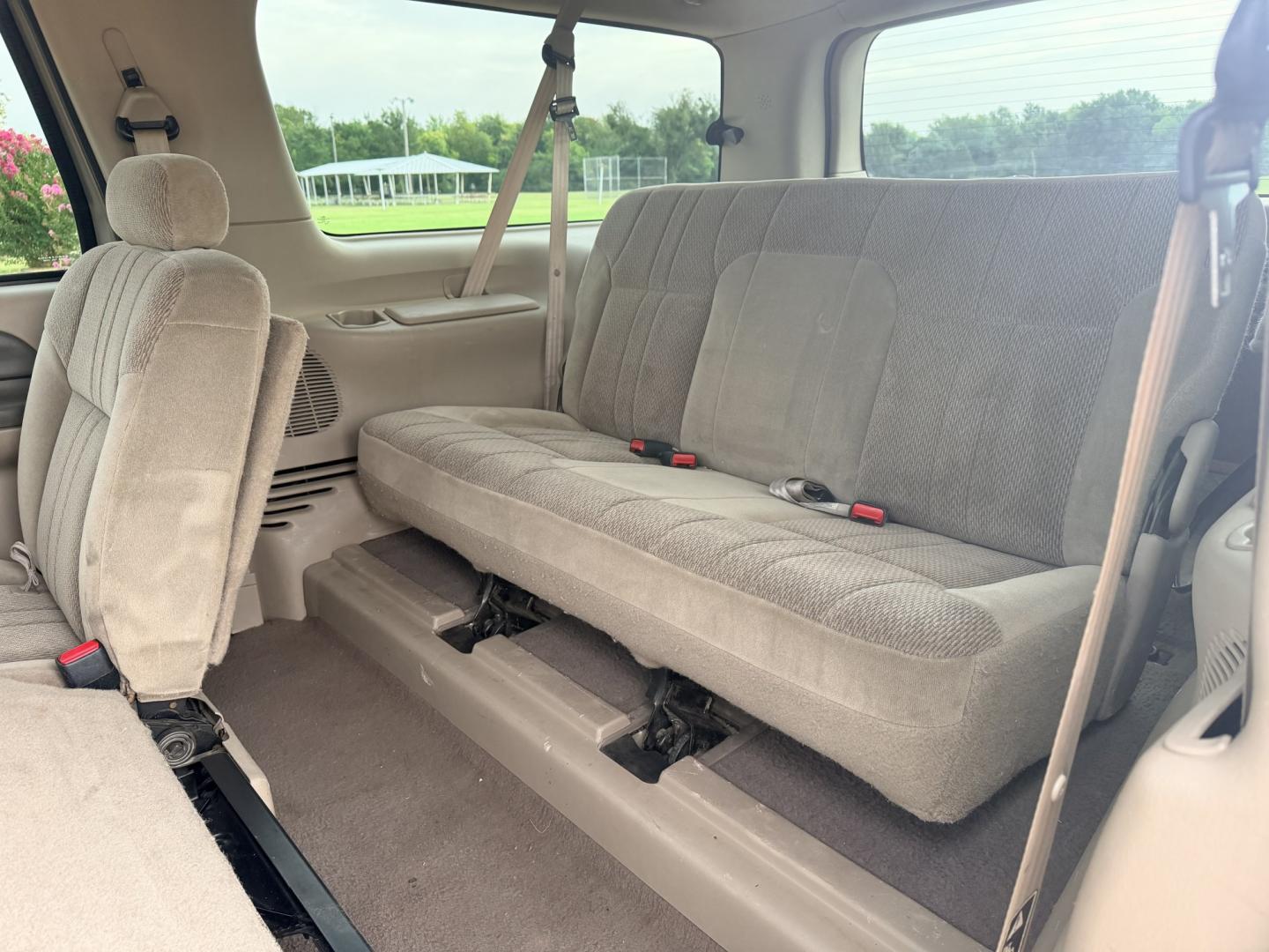 2000 GOLD /TAN Ford Excursion XLT 2WD (1FMNU40SXYE) with an 6.8L V10 SOHC 20V engine, 4A OD transmission, located at 17760 Hwy 62, Morris, OK, 74445, (918) 733-4887, 35.609104, -95.877060 - 2000 FORD EXCURSION 2WD HAS 6.8L V10 ENGINE. FEATURING POWER LOCKS, POWER WINDOWS, POWER SEATS, POWER MIRRORS, CLOTH INTERIOR, AM/FM STEREO, CD PLAYER, CASSETTE PLAYER, REAR CLIMATE CONTROL, CRUISE CONTROL, AND 3RD ROW SEATING. TIRES LT265/75R16 TIRES AND 217,879 MILES. HAS A CLEAN TITLE. WE OFFER- Photo#15