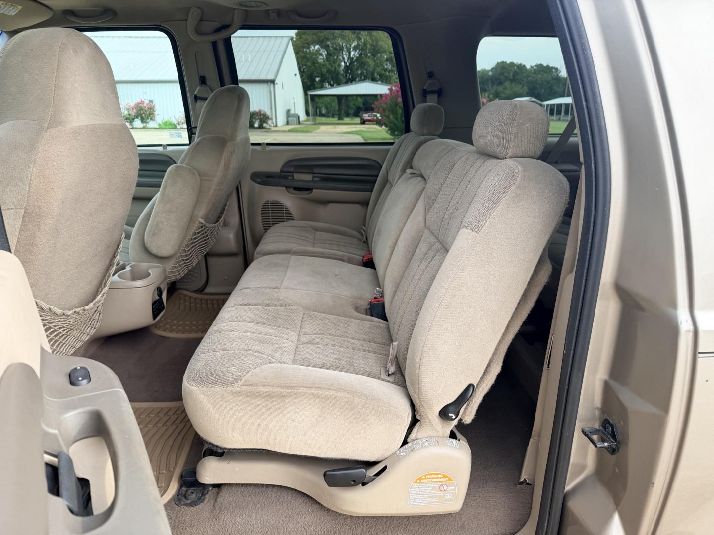 2000 GOLD /TAN Ford Excursion XLT 2WD (1FMNU40SXYE) with an 6.8L V10 SOHC 20V engine, 4A OD transmission, located at 17760 Hwy 62, Morris, OK, 74445, (918) 733-4887, 35.609104, -95.877060 - 2000 FORD EXCURSION 2WD HAS 6.8L V10 ENGINE. FEATURING POWER LOCKS, POWER WINDOWS, POWER SEATS, POWER MIRRORS, CLOTH INTERIOR, AM/FM STEREO, CD PLAYER, CASSETTE PLAYER, REAR CLIMATE CONTROL, CRUISE CONTROL, AND 3RD ROW SEATING. TIRES LT265/75R16 TIRES AND 217,879 MILES. HAS A CLEAN TITLE. WE OFFER- Photo#14