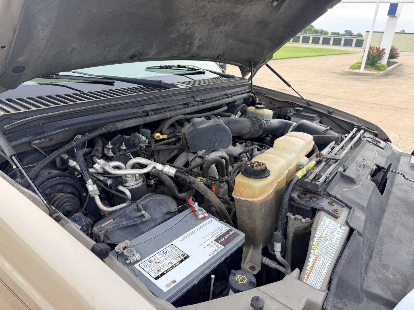 2000 GOLD /TAN Ford Excursion XLT 2WD (1FMNU40SXYE) with an 6.8L V10 SOHC 20V engine, 4A OD transmission, located at 17760 Hwy 62, Morris, OK, 74445, (918) 733-4887, 35.609104, -95.877060 - 2000 FORD EXCURSION 2WD HAS 6.8L V10 ENGINE. FEATURING POWER LOCKS, POWER WINDOWS, POWER SEATS, POWER MIRRORS, CLOTH INTERIOR, AM/FM STEREO, CD PLAYER, CASSETTE PLAYER, REAR CLIMATE CONTROL, CRUISE CONTROL, AND 3RD ROW SEATING. TIRES LT265/75R16 TIRES AND 217,879 MILES. HAS A CLEAN TITLE. WE OFFER- Photo#20