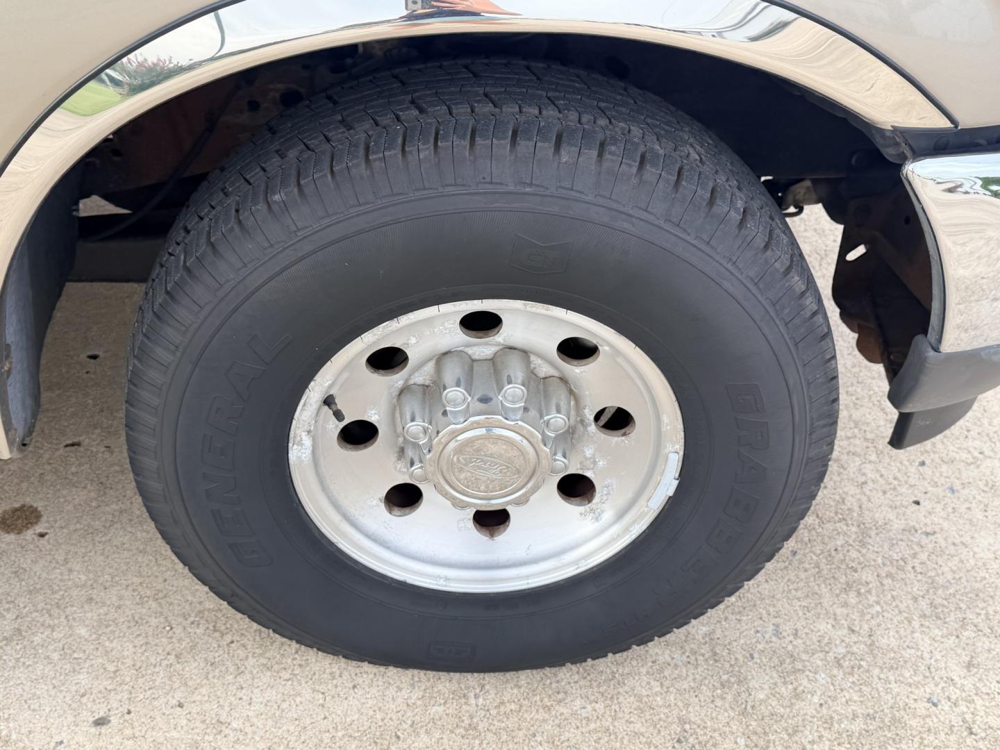 2000 GOLD /TAN Ford Excursion XLT 2WD (1FMNU40SXYE) with an 6.8L V10 SOHC 20V engine, 4A OD transmission, located at 17760 Hwy 62, Morris, OK, 74445, (918) 733-4887, 35.609104, -95.877060 - 2000 FORD EXCURSION 2WD HAS 6.8L V10 ENGINE. FEATURING POWER LOCKS, POWER WINDOWS, POWER SEATS, POWER MIRRORS, CLOTH INTERIOR, AM/FM STEREO, CD PLAYER, CASSETTE PLAYER, REAR CLIMATE CONTROL, CRUISE CONTROL, AND 3RD ROW SEATING. TIRES LT265/75R16 TIRES AND 217,879 MILES. HAS A CLEAN TITLE. WE OFFER- Photo#24
