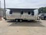2005 Silver /TAN AIRSTREAM SAFARI - (1STGPYJ295J) , located at 17760 Hwy 62, Morris, OK, 74445, 35.609104, -95.877060 - 2005 AIRSTREAM SAFARI 25.5FT OVERALL WITH 16FT MANUAL AWNING. IN THE LIVING AND KITCHEN AREA IS A SOFA THAT FOLDS DOWN FOR ADDITIONAL SLEEPING, STORAGE UNDER THE SOFA, OVERHEAD CABINETS, FOLD OUT DINETTE TABLE, FOLD OUT END TABLE, 3 BURNING STOVE WITH OVEN, DOUBLE STAINLESS STEEL SINK, OVERHEAD CAB- Photo#1