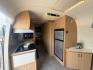 2005 Silver /TAN AIRSTREAM SAFARI - (1STGPYJ295J) , located at 17760 Hwy 62, Morris, OK, 74445, 35.609104, -95.877060 - 2005 AIRSTREAM SAFARI 25.5FT OVERALL WITH 16FT MANUAL AWNING. IN THE LIVING AND KITCHEN AREA IS A SOFA THAT FOLDS DOWN FOR ADDITIONAL SLEEPING, STORAGE UNDER THE SOFA, OVERHEAD CABINETS, FOLD OUT DINETTE TABLE, FOLD OUT END TABLE, 3 BURNING STOVE WITH OVEN, DOUBLE STAINLESS STEEL SINK, OVERHEAD CAB- Photo#9