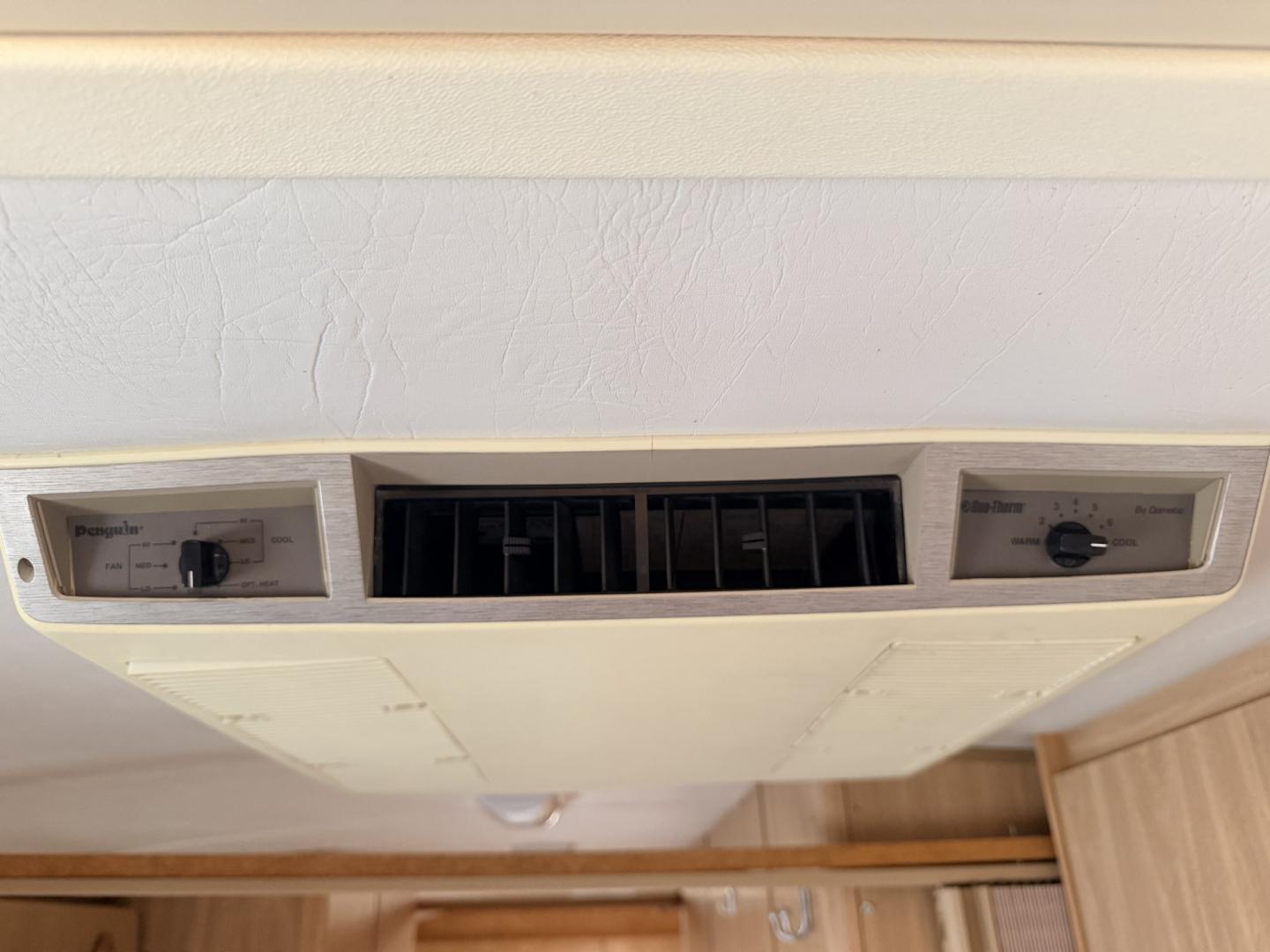 2005 Silver /TAN AIRSTREAM SAFARI - (1STGPYJ295J) , located at 17760 Hwy 62, Morris, OK, 74445, 35.609104, -95.877060 - 2005 AIRSTREAM SAFARI 25.5FT OVERALL WITH 16FT MANUAL AWNING. IN THE LIVING AND KITCHEN AREA IS A SOFA THAT FOLDS DOWN FOR ADDITIONAL SLEEPING, STORAGE UNDER THE SOFA, OVERHEAD CABINETS, FOLD OUT DINETTE TABLE, FOLD OUT END TABLE, 3 BURNING STOVE WITH OVEN, DOUBLE STAINLESS STEEL SINK, OVERHEAD CAB- Photo#23