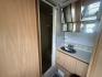 2005 Silver /TAN AIRSTREAM SAFARI - (1STGPYJ295J) , located at 17760 Hwy 62, Morris, OK, 74445, 35.609104, -95.877060 - 2005 AIRSTREAM SAFARI 25.5FT OVERALL WITH 16FT MANUAL AWNING. IN THE LIVING AND KITCHEN AREA IS A SOFA THAT FOLDS DOWN FOR ADDITIONAL SLEEPING, STORAGE UNDER THE SOFA, OVERHEAD CABINETS, FOLD OUT DINETTE TABLE, FOLD OUT END TABLE, 3 BURNING STOVE WITH OVEN, DOUBLE STAINLESS STEEL SINK, OVERHEAD CAB- Photo#31